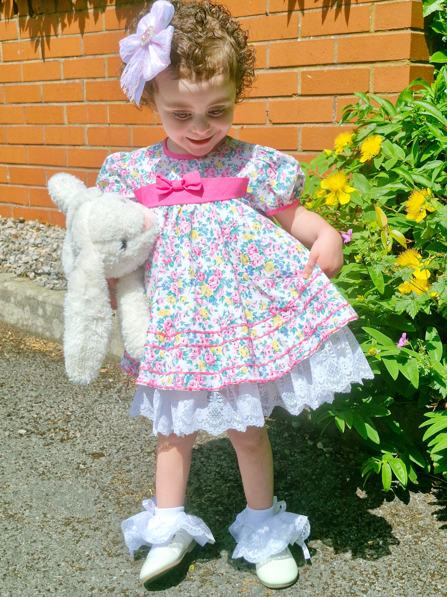 2-3 years. White and pink floral Jolene, full circle with lace hem