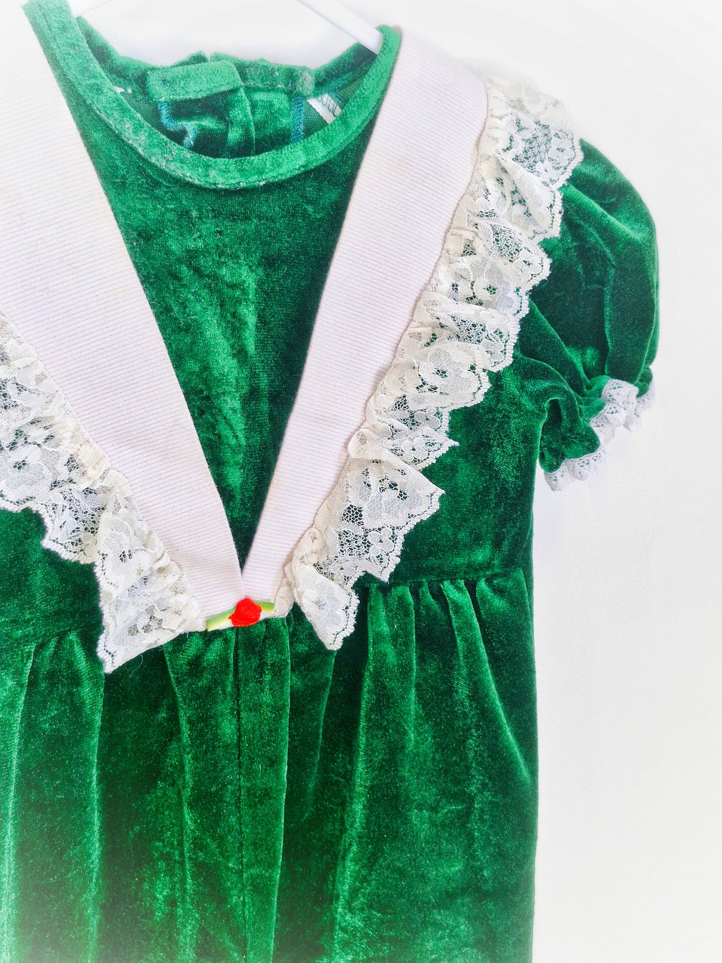 18-24 months. Green velvet vintage romper from Violet Rose & Co. White frilly details