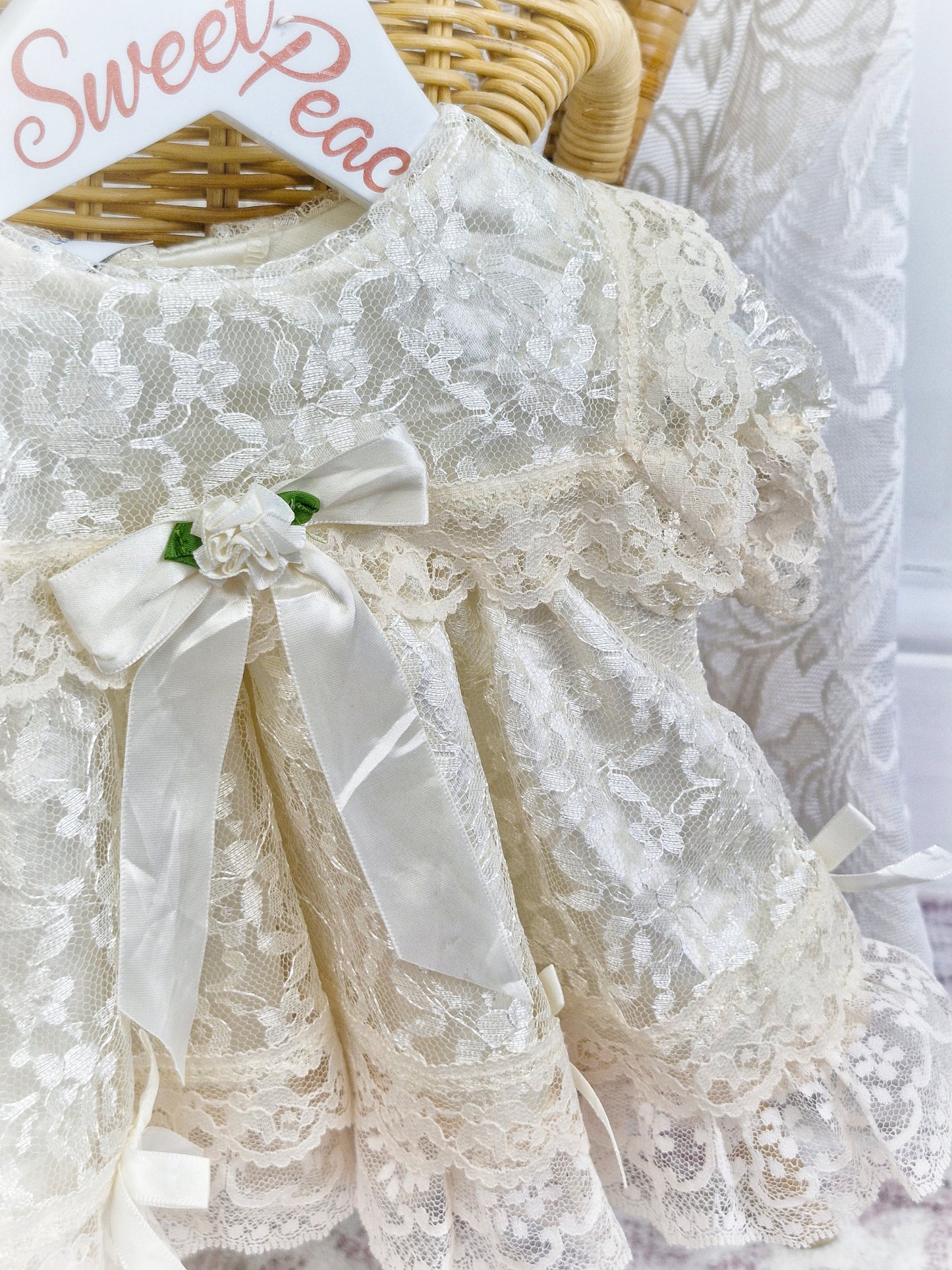 0-6 months Jolene. Off-white lace dress with ribbon