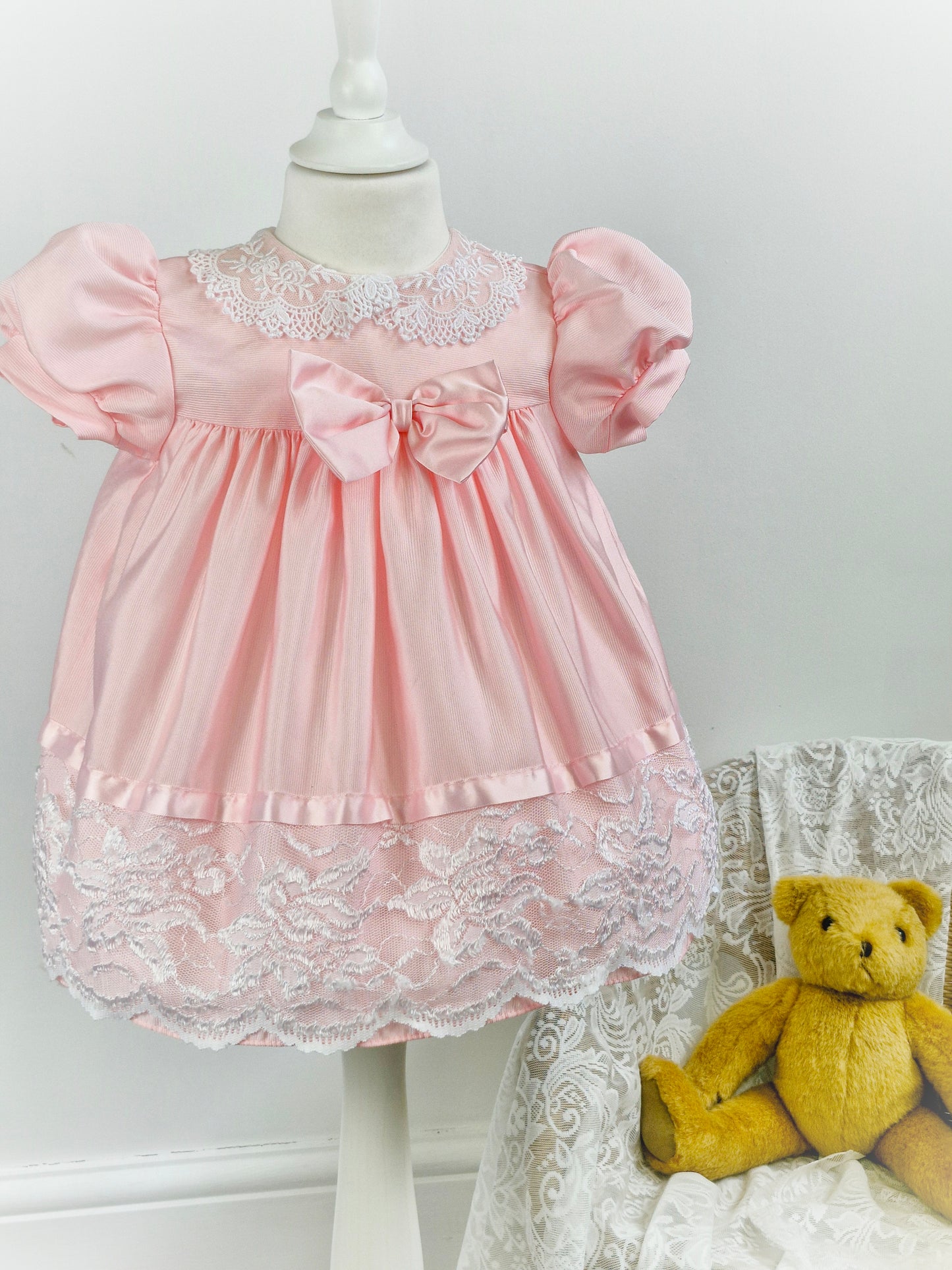2 years. Pink Jolene with lace, ribbon and large bow