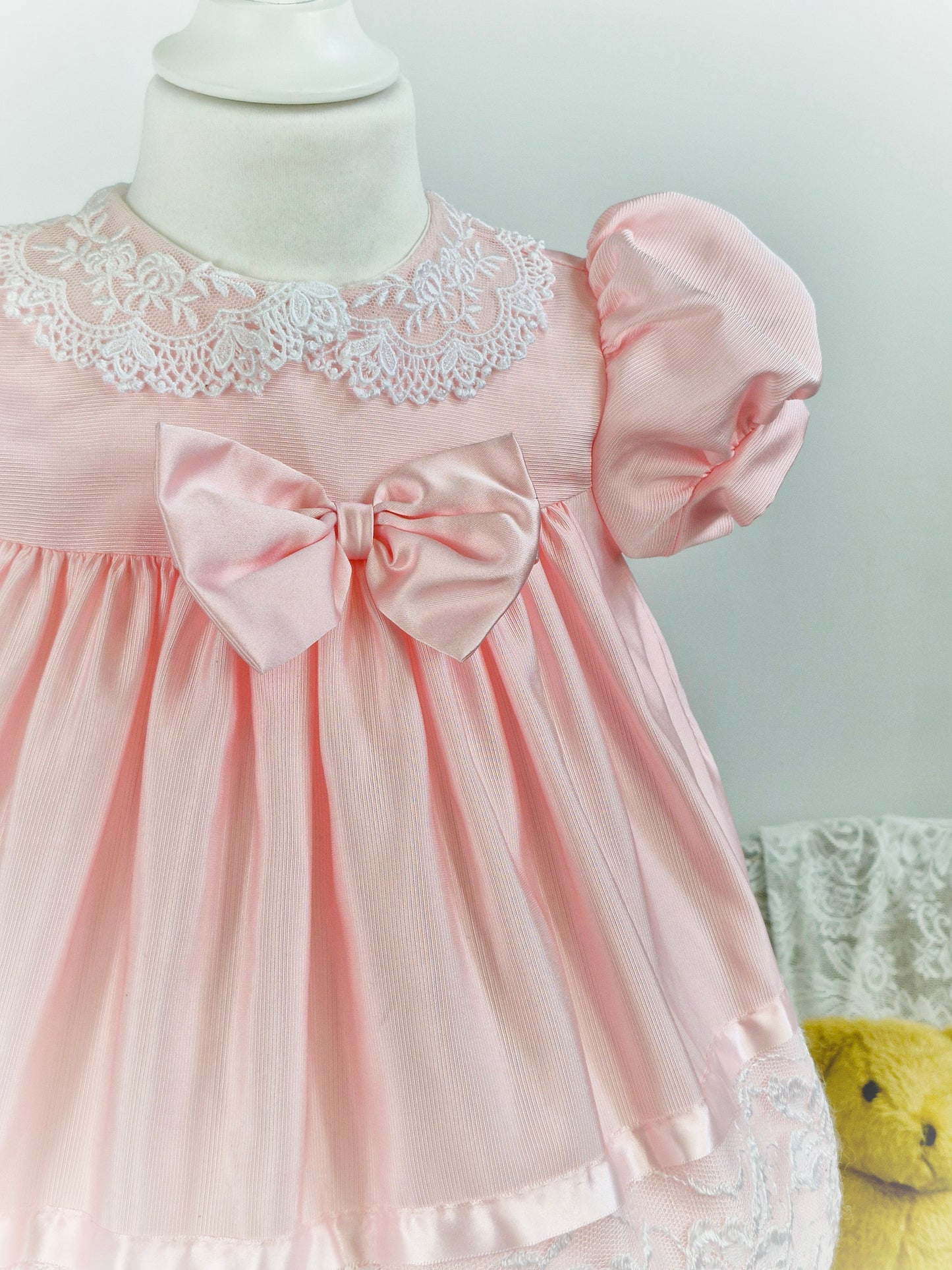 2 years. Pink Jolene with lace, ribbon and large bow