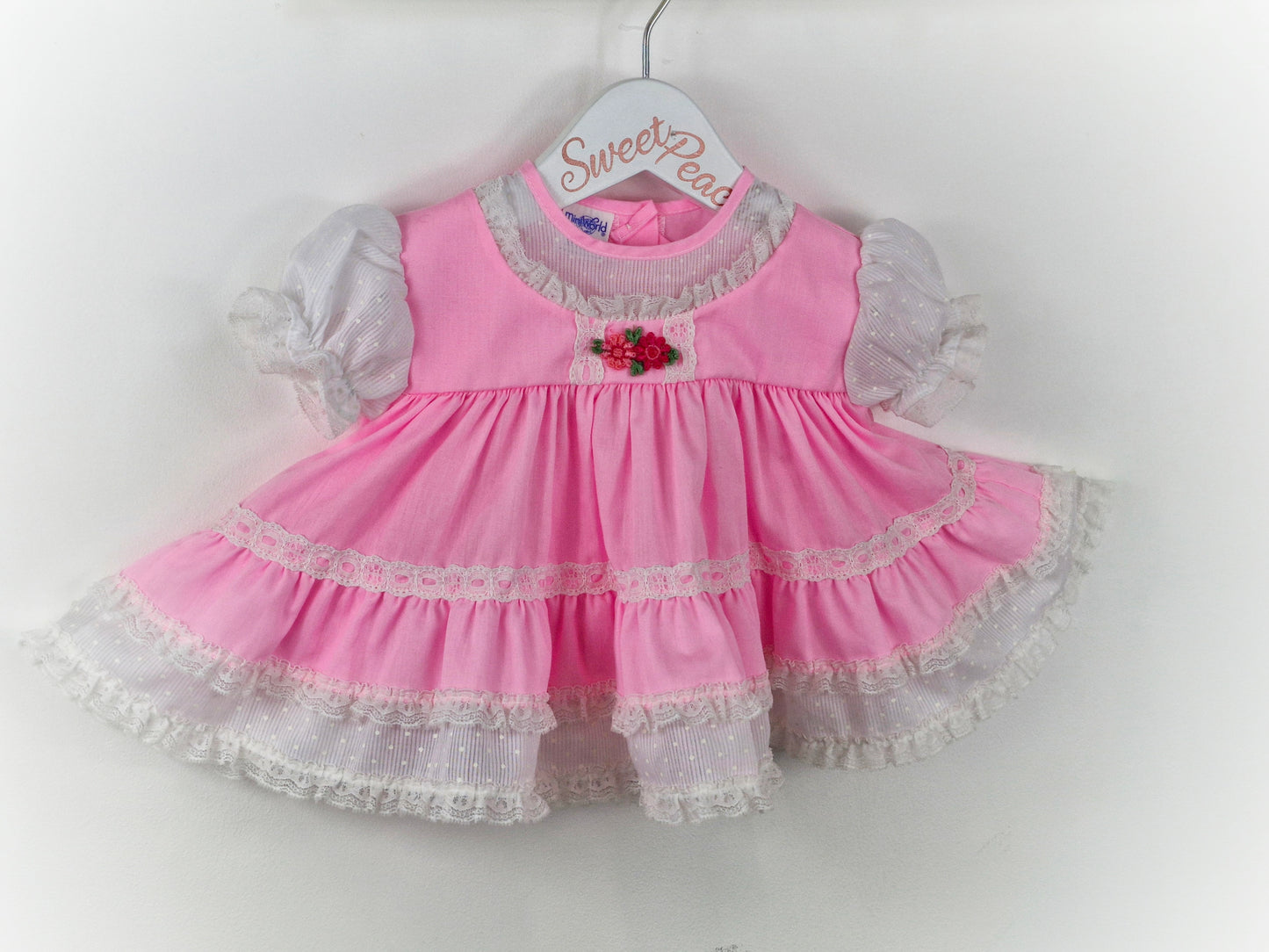 0-6 months. Miniworld pink, frilly, full circle dress