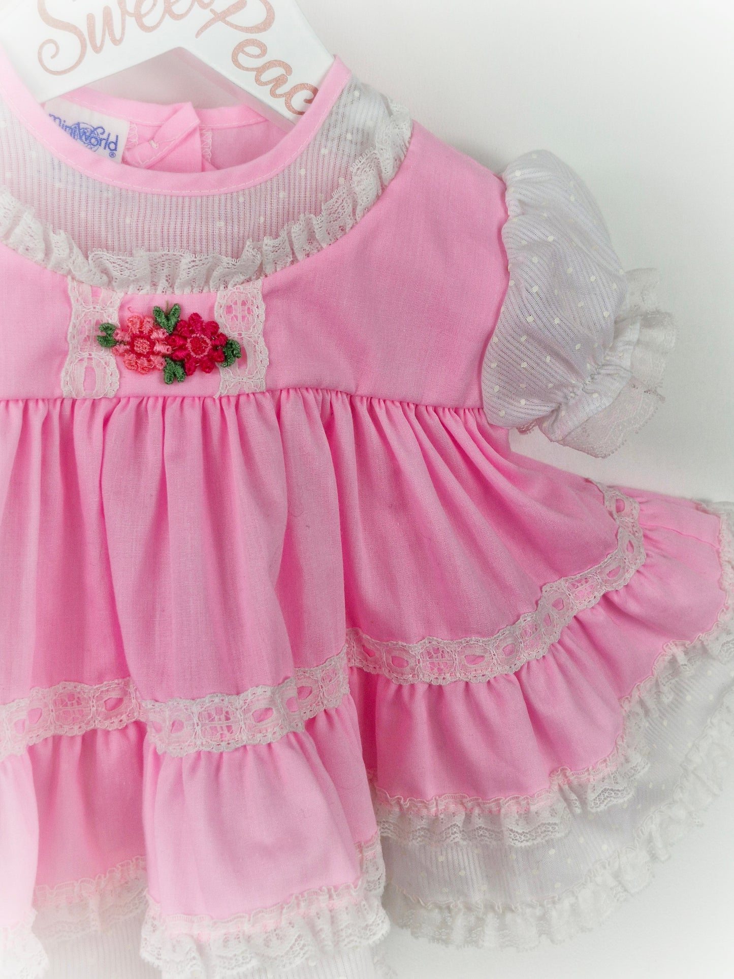 0-6 months. Miniworld pink, frilly, full circle dress