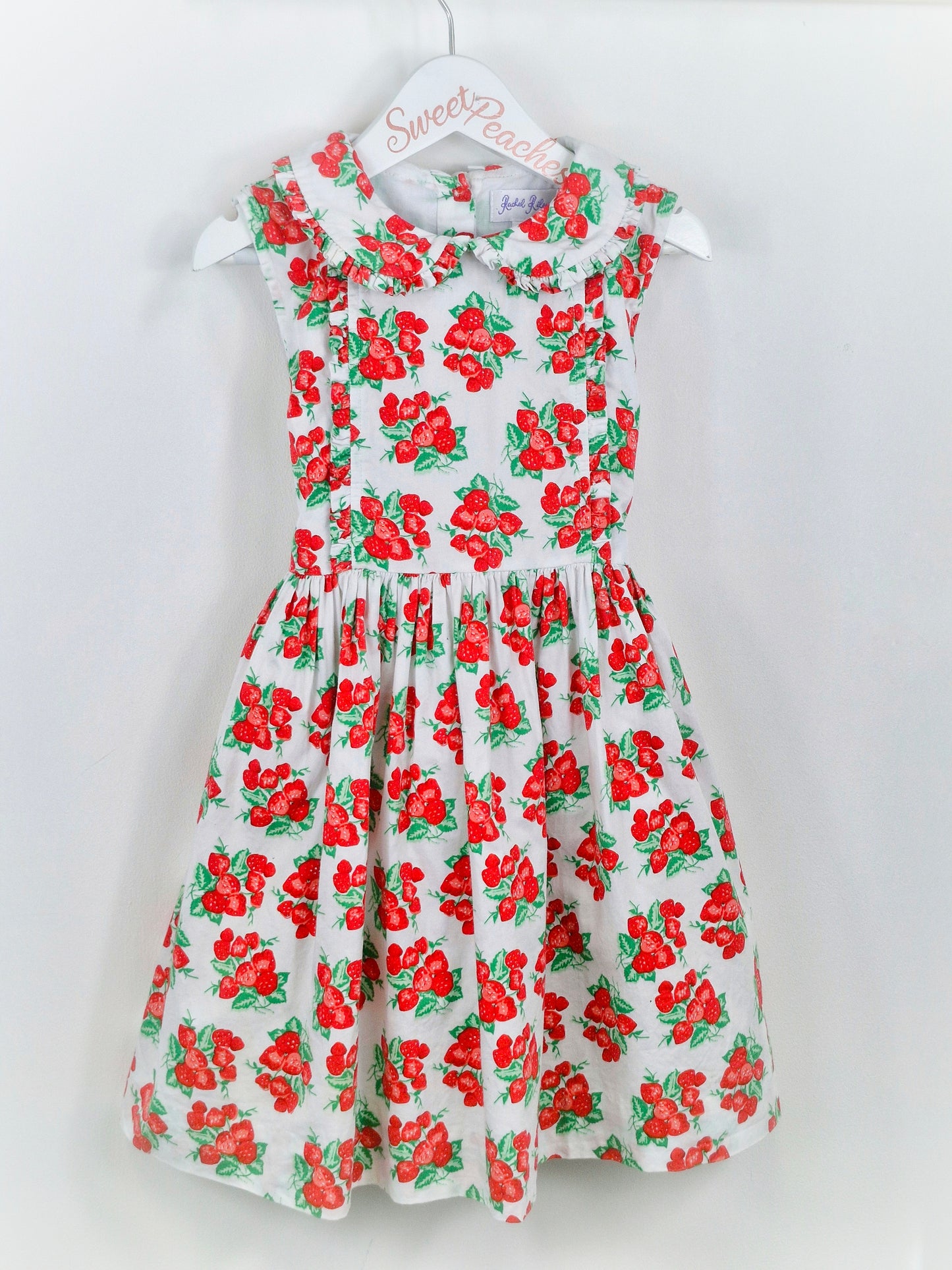 5 years. Vintage inspired Rachel Riley sleeveless strawberry print dress with collar
