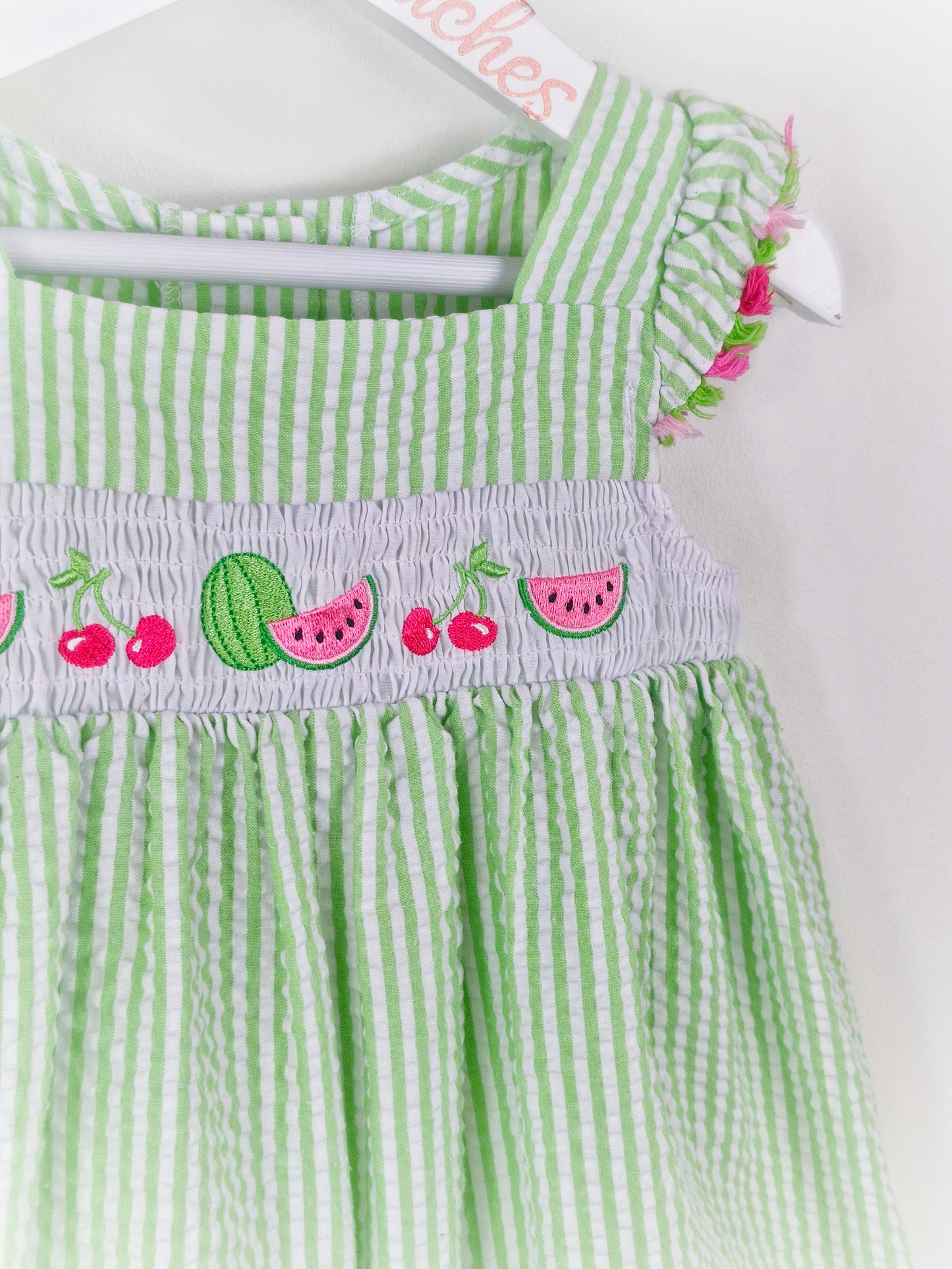 2 years. Vintage inspired Goodlad green and white seersucker striped dress with fruit smock