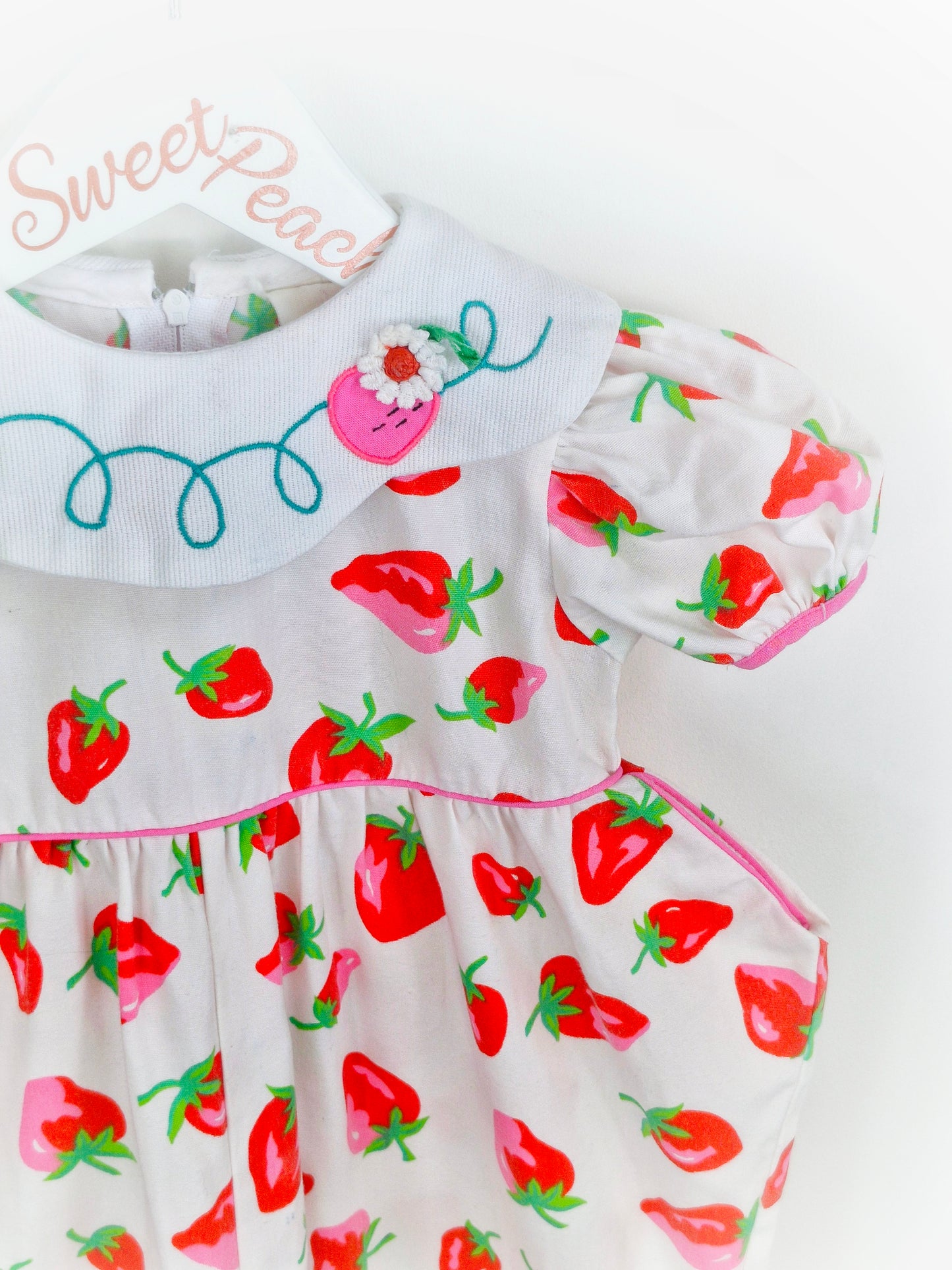 18-24 months. White vintage romper with strawberry print and embroidered collar