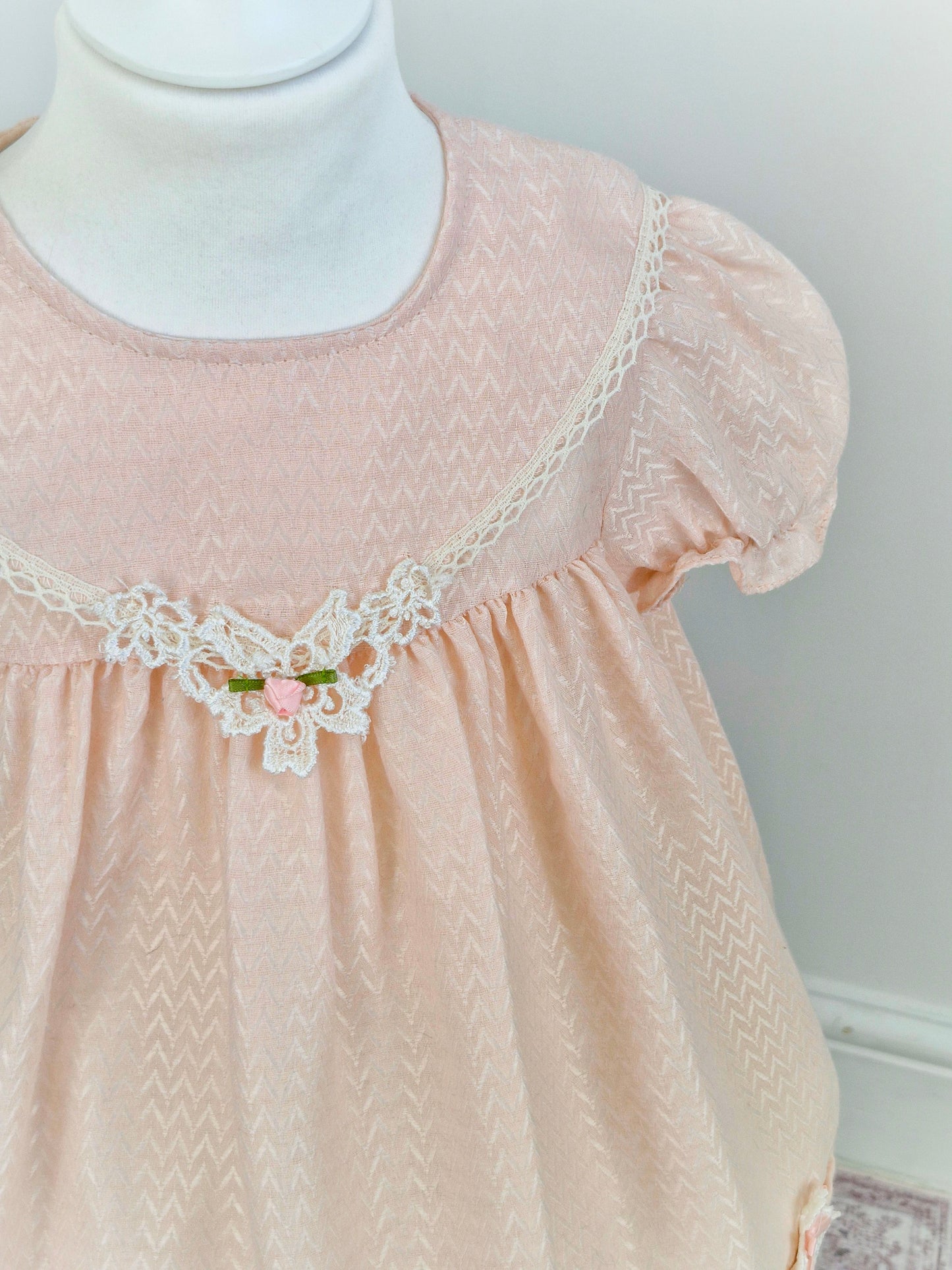 3-4 years. Light pink vintage Jolene with lace hem and delicate lace applique with pink ribbon rose