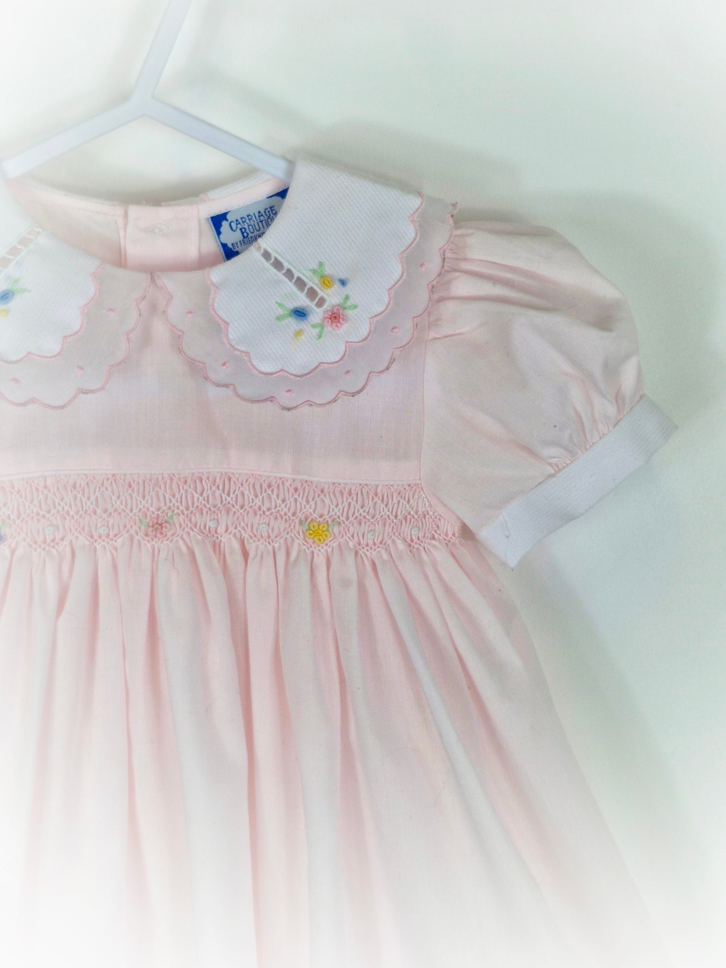 18 months. Pink vintage smock from Carriage Boutique with white collar
