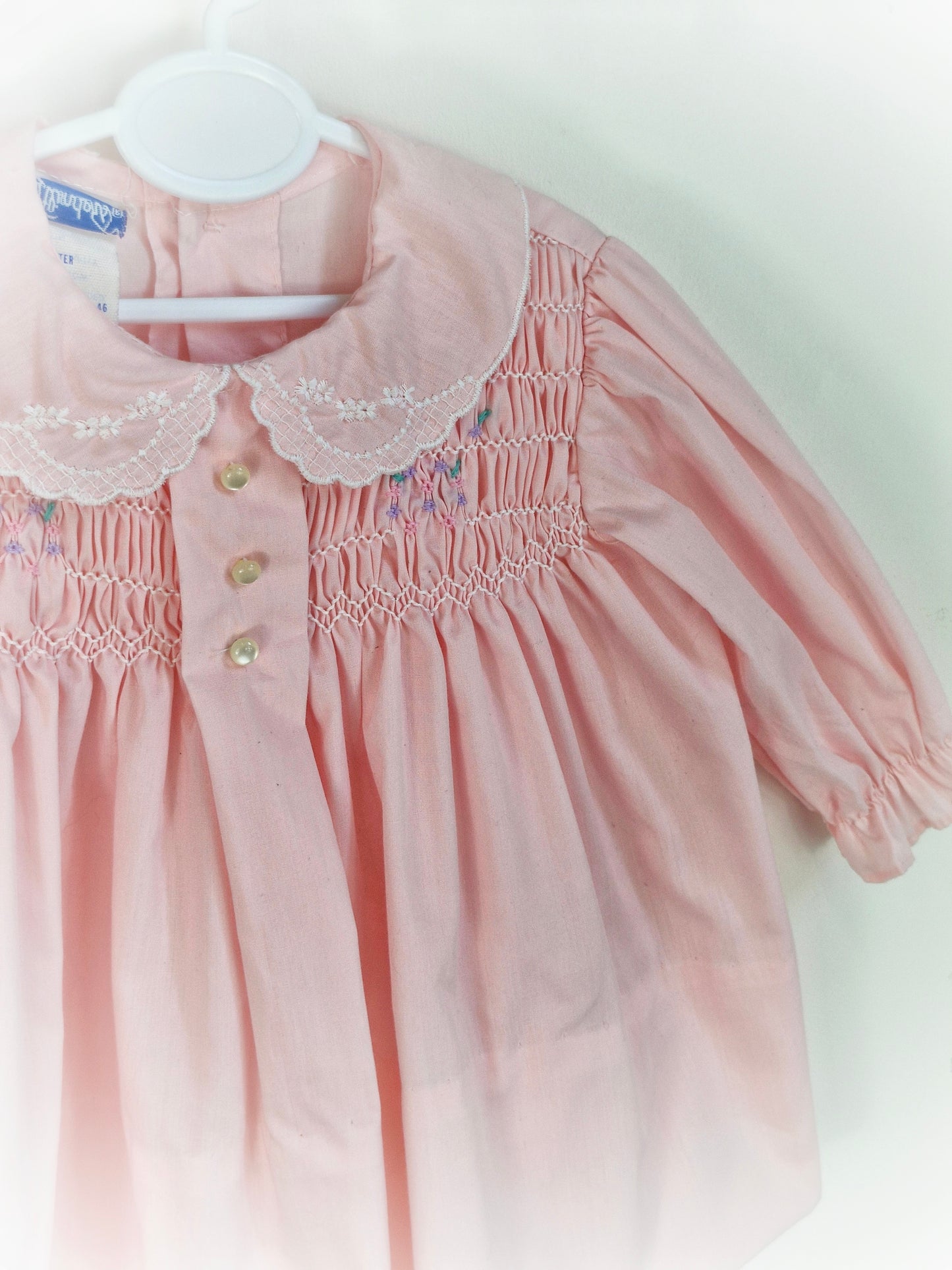 9-12 months. Pink Polly Flinders long sleeve vintage dress with embroidered collar and smocking