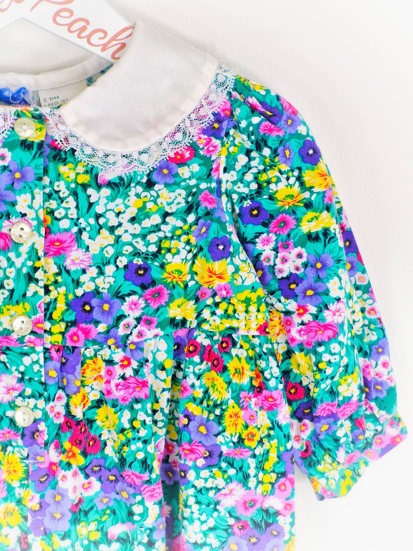 12-18 months. Floral vintage Nannette romper with white collar