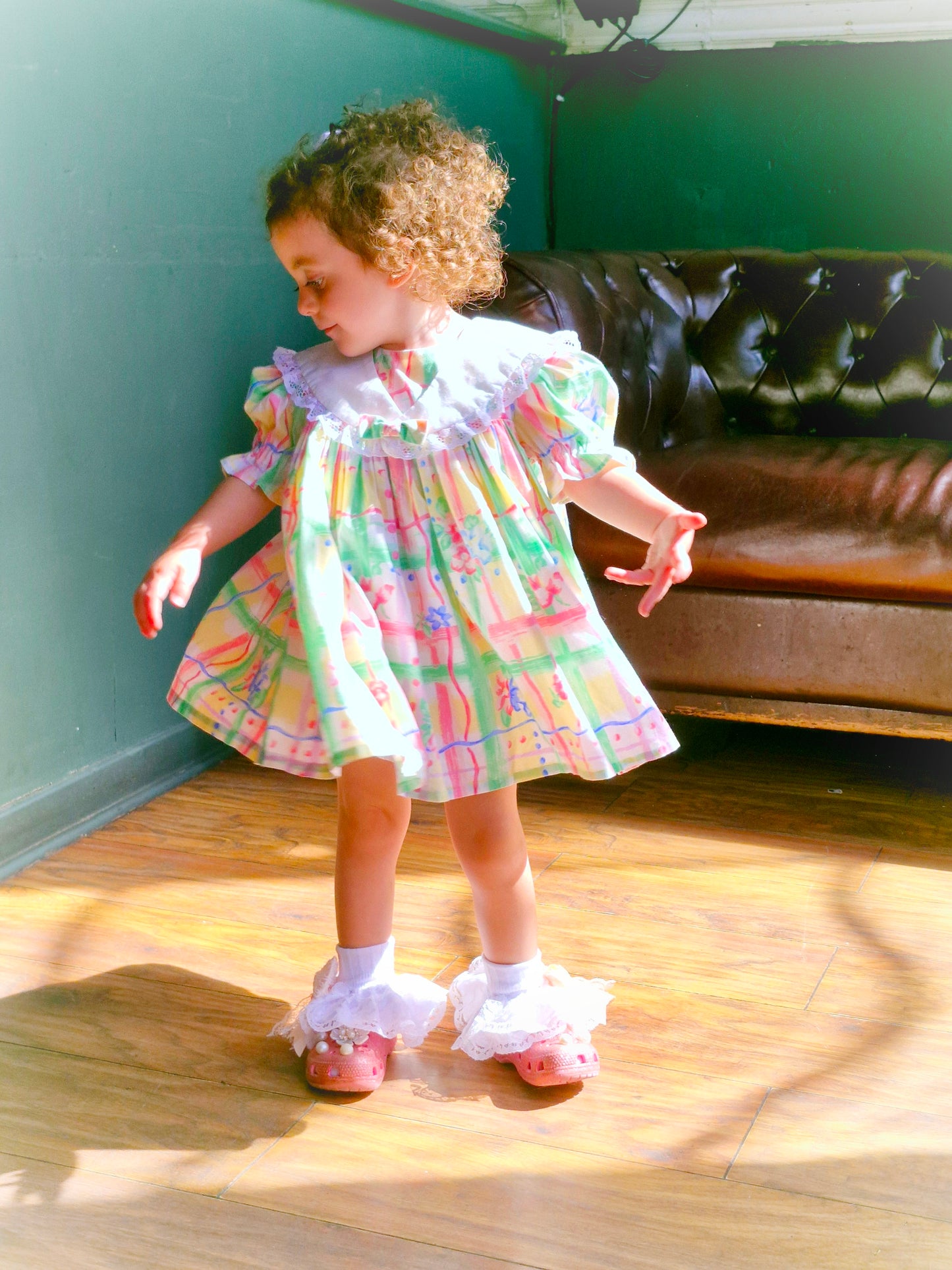 2 years. Handmade dress made with vintage fabric