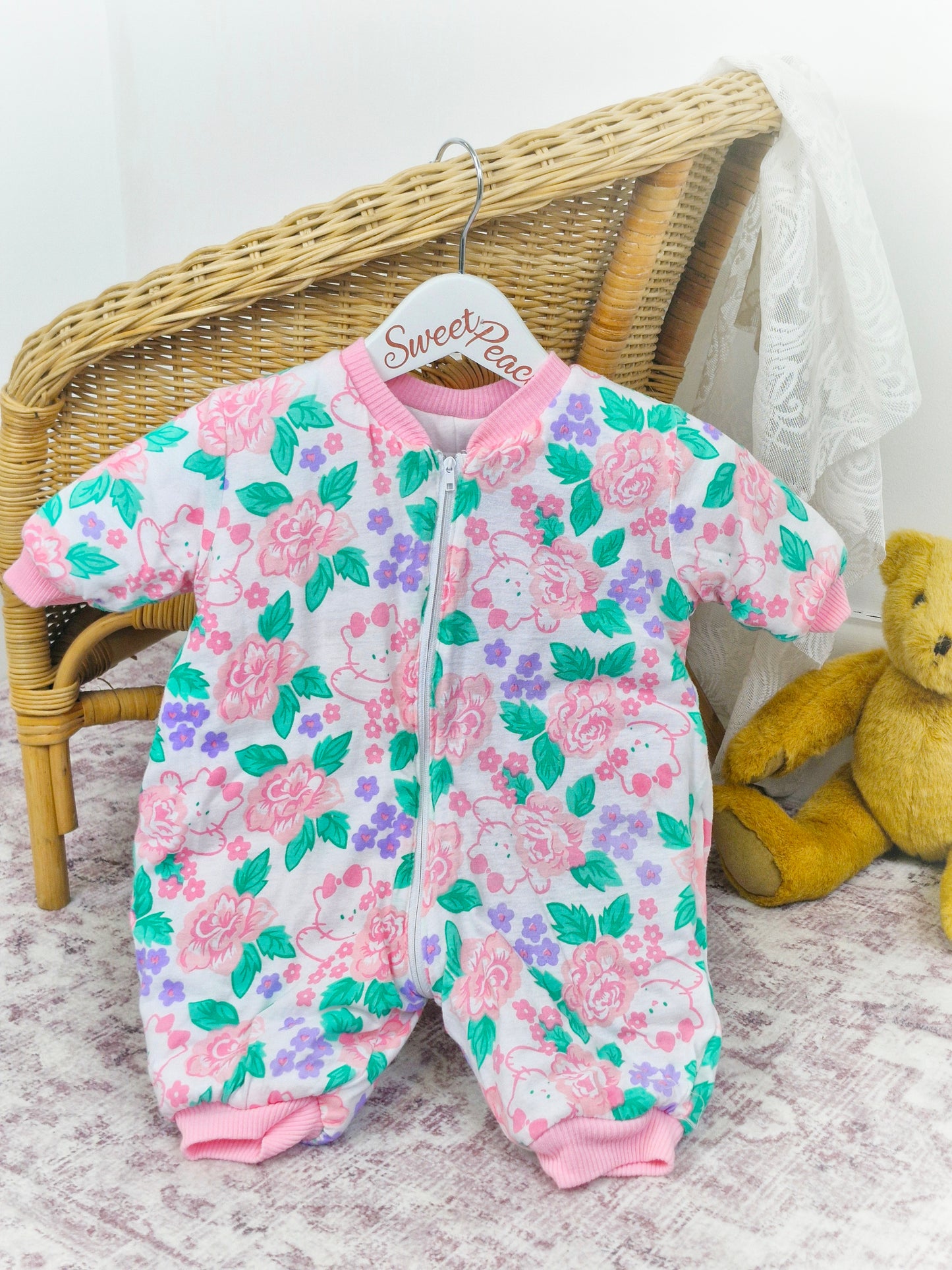 6-12 months. Reversible vintage padded snowsuit in pastel colours