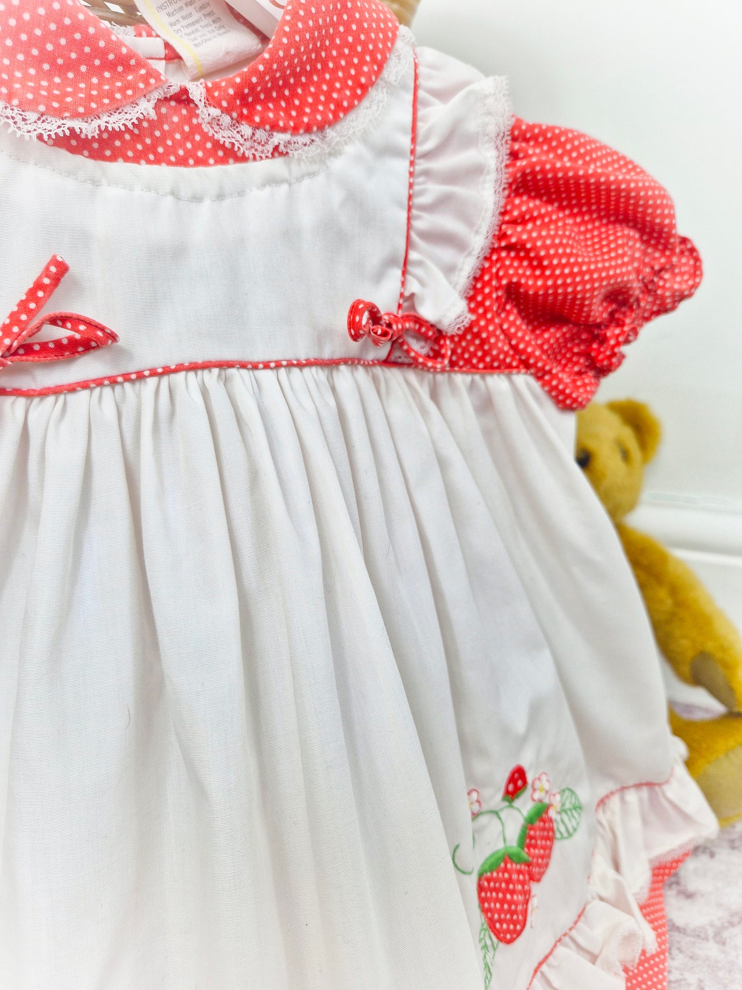 18-24 months. Red and white vintage strawberry dress