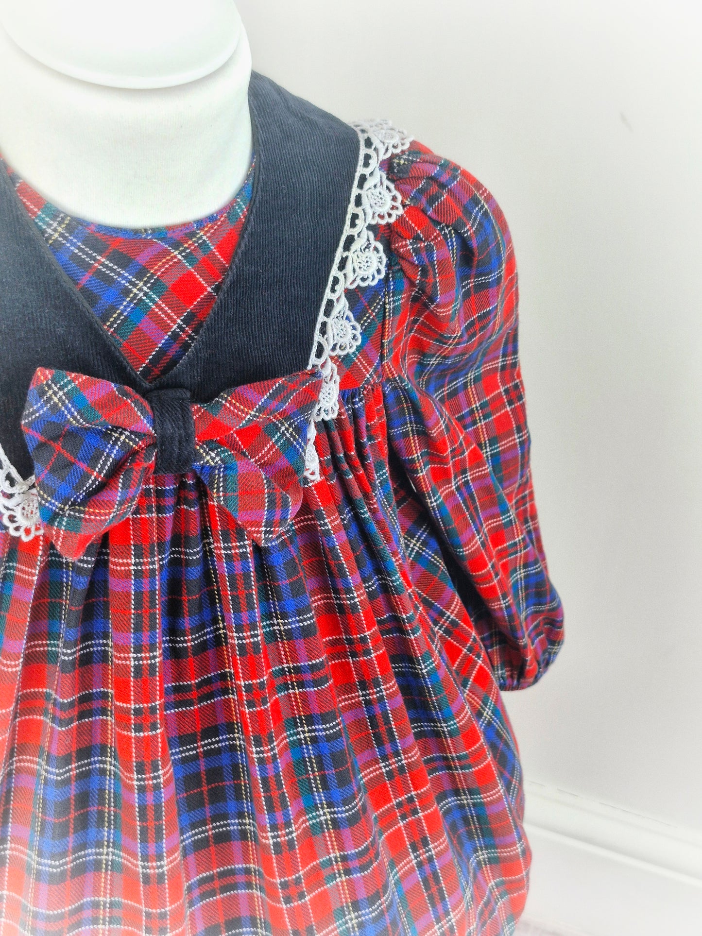 2 years. Red and navy tartan vintage dress from Ruth of Carolina.