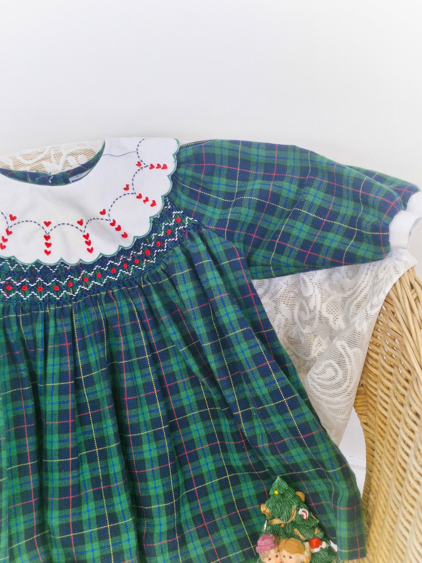 12-18 months. Carriage Boutique green tartan dress with smocking and embroidered bib