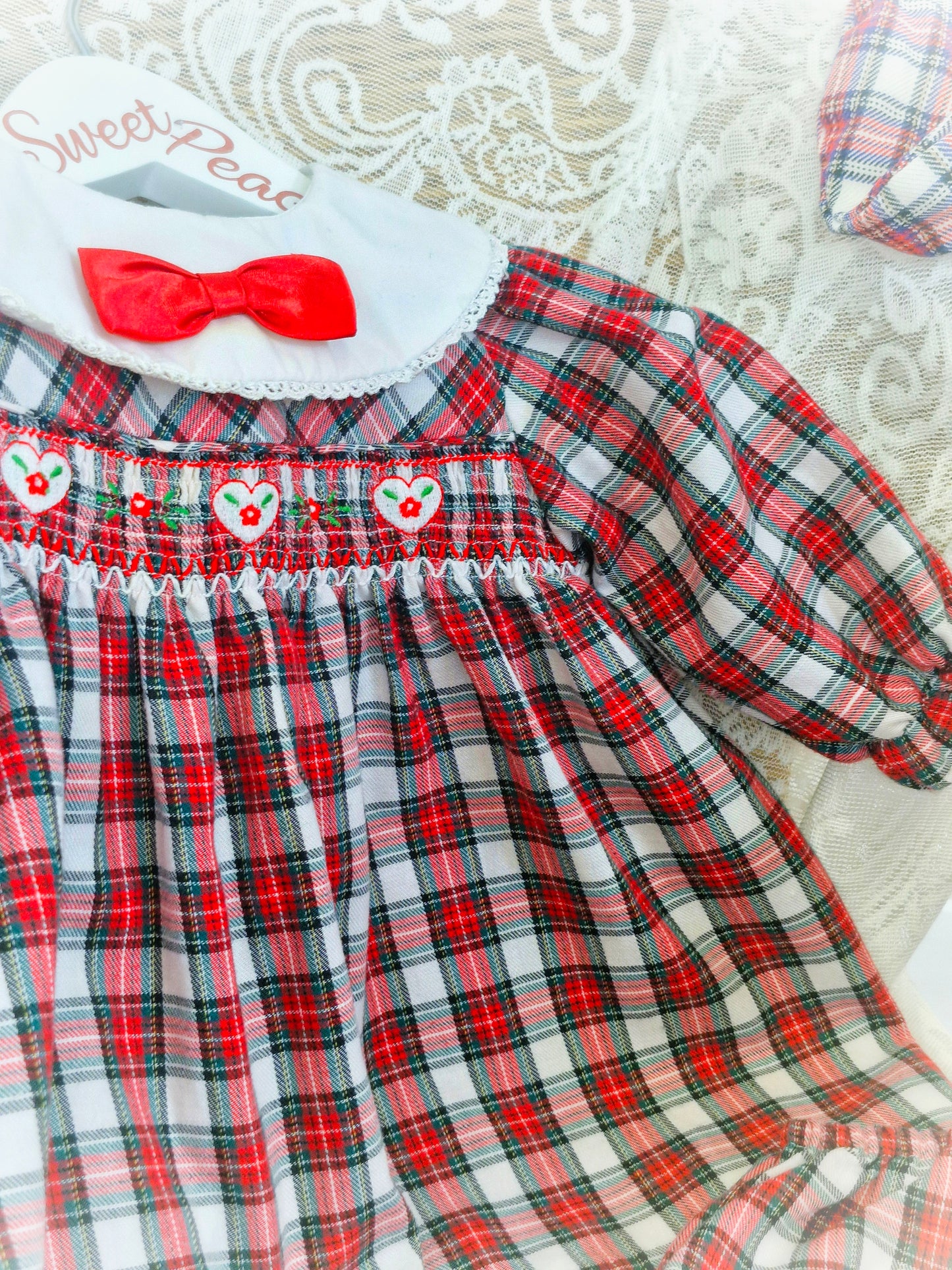 9-12 months. Checkered dress and bloomers set with smocking. Free hat