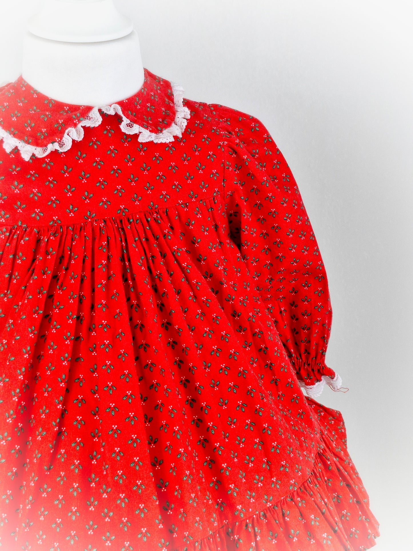 18-24 months. Red vintage Bryan dress with Peter Pan collar and mistletoe print