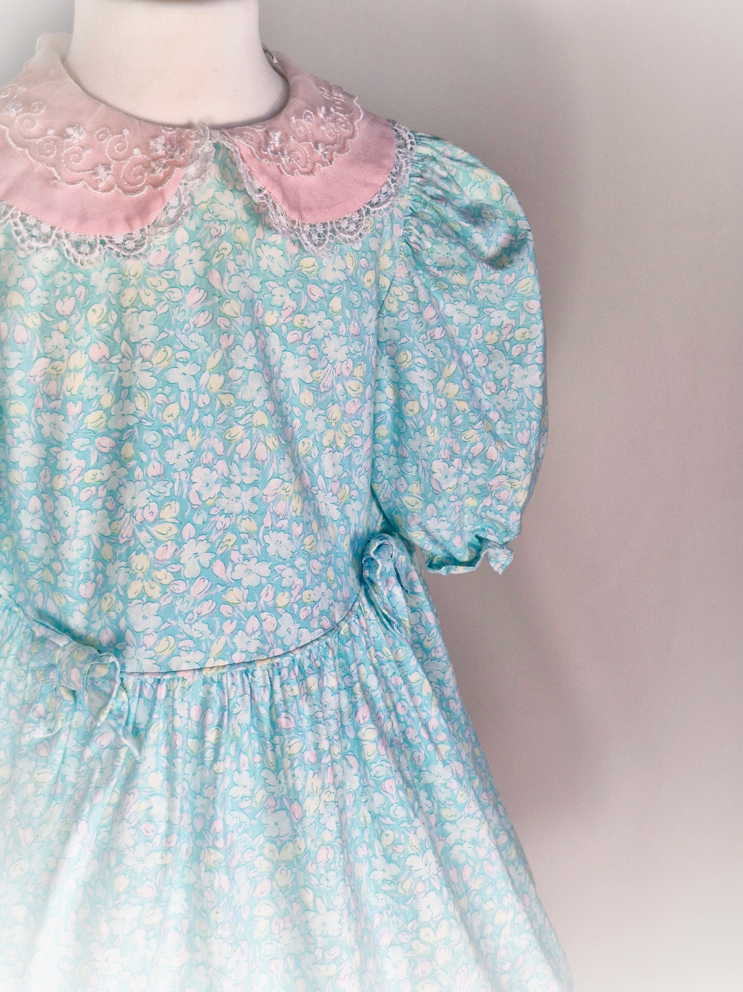 5 years. Light blue and pink floral vintage dress with lace details