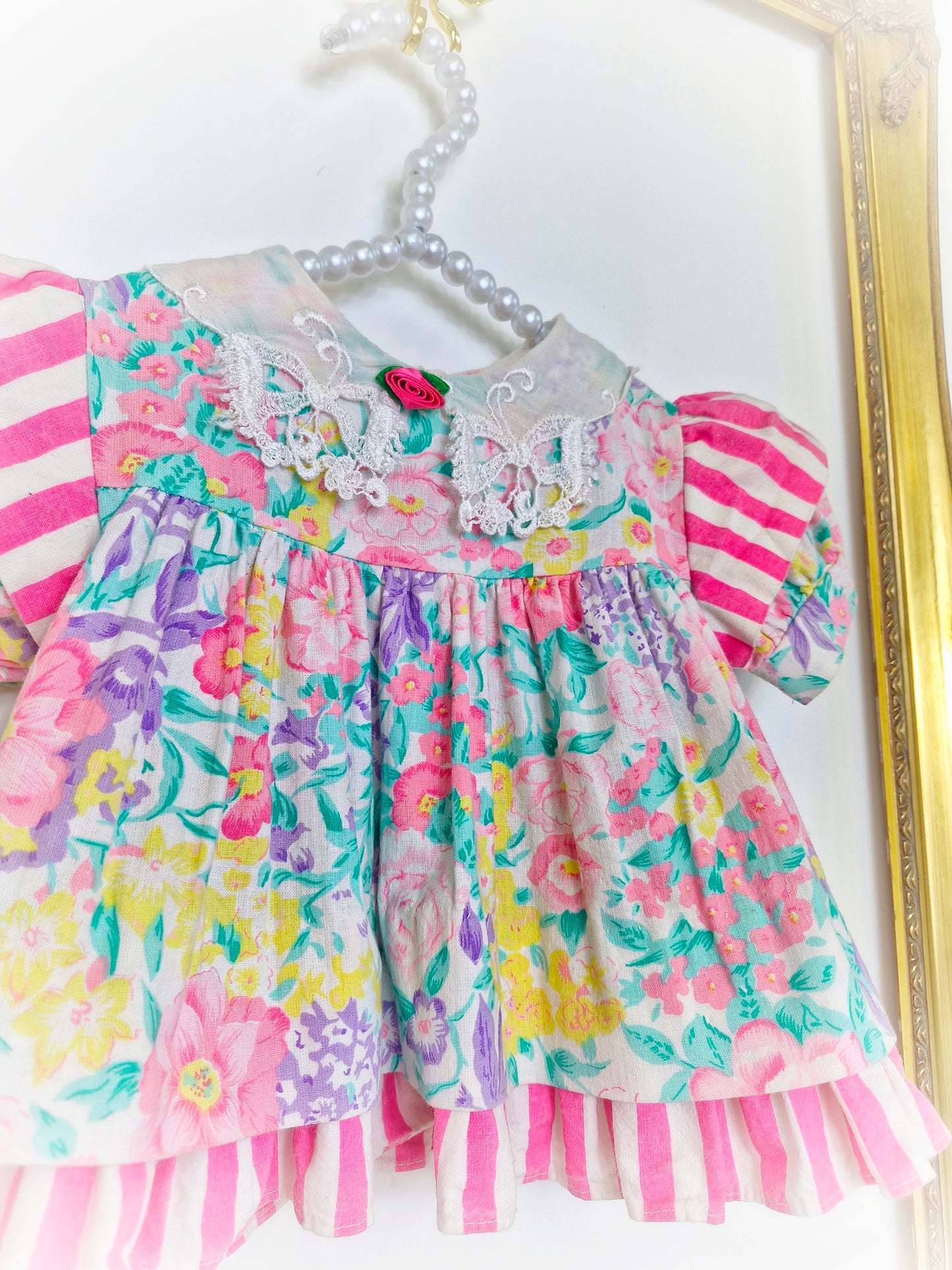 0-3 months. Bright floral vintage dress by Allison Ann.