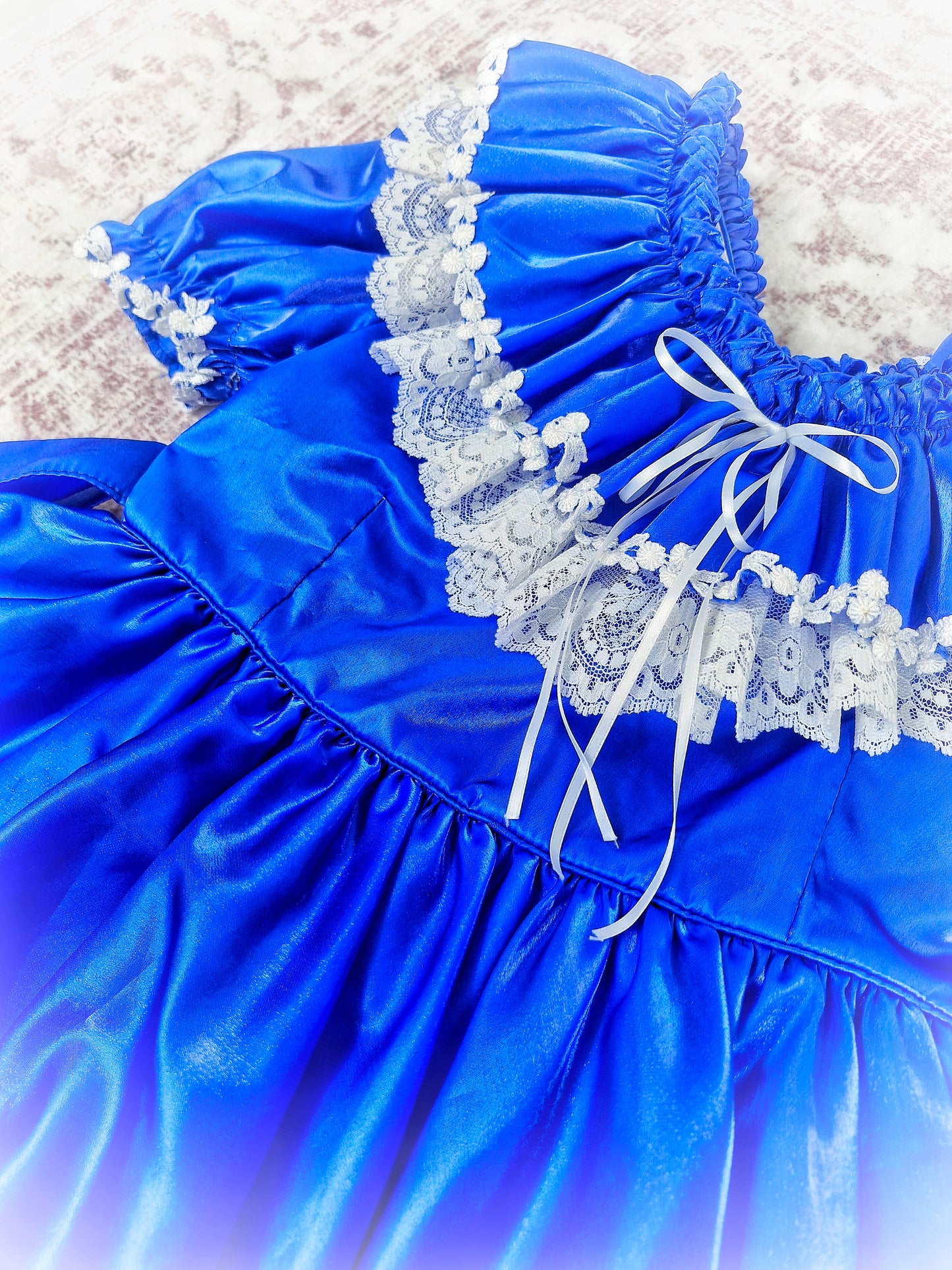 5-6 years. Royal blue vintage gown with white lace details and Ruffles at the back