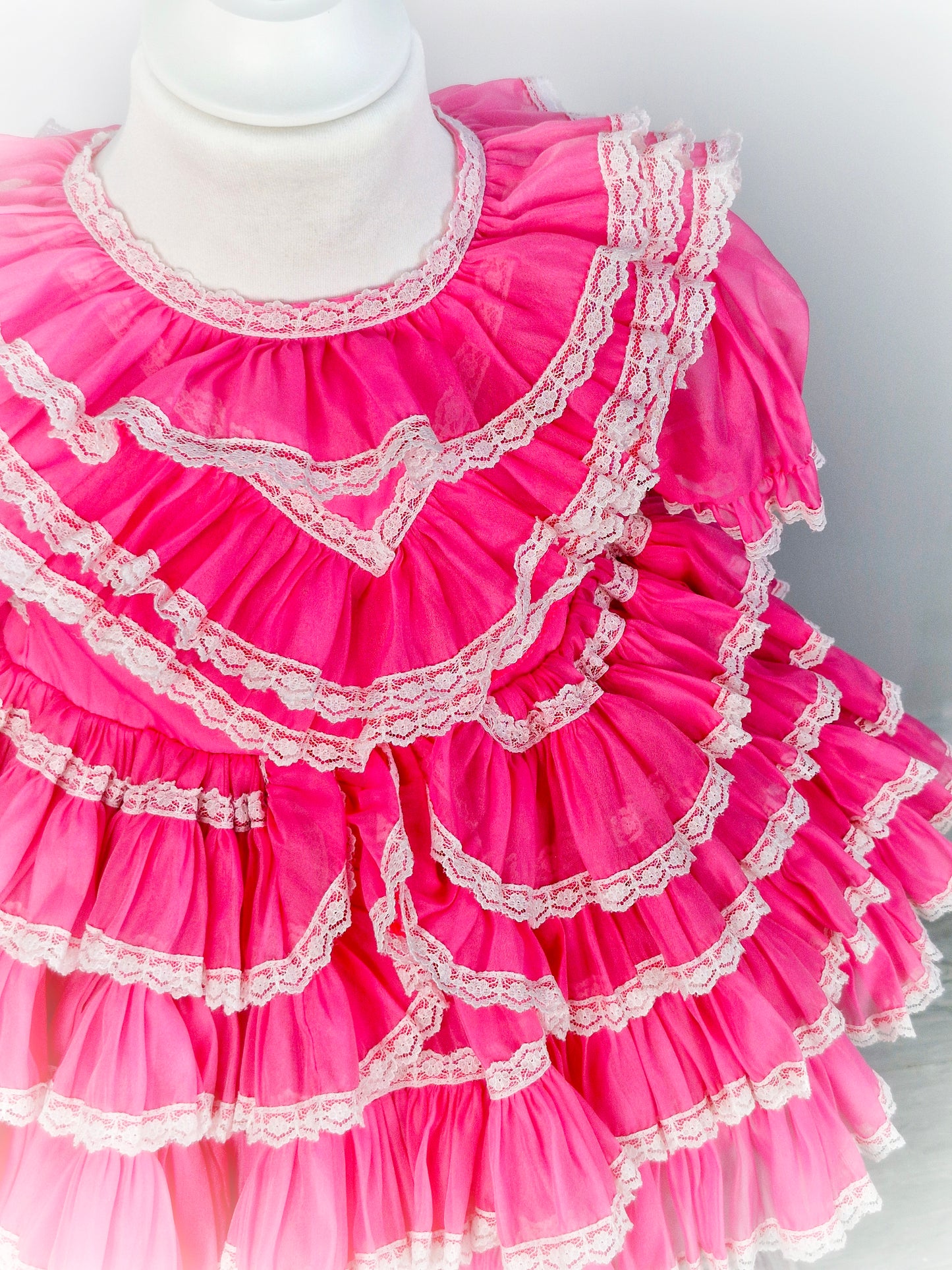 2 years. Hot pink vintage ruffle dress with white lace trim