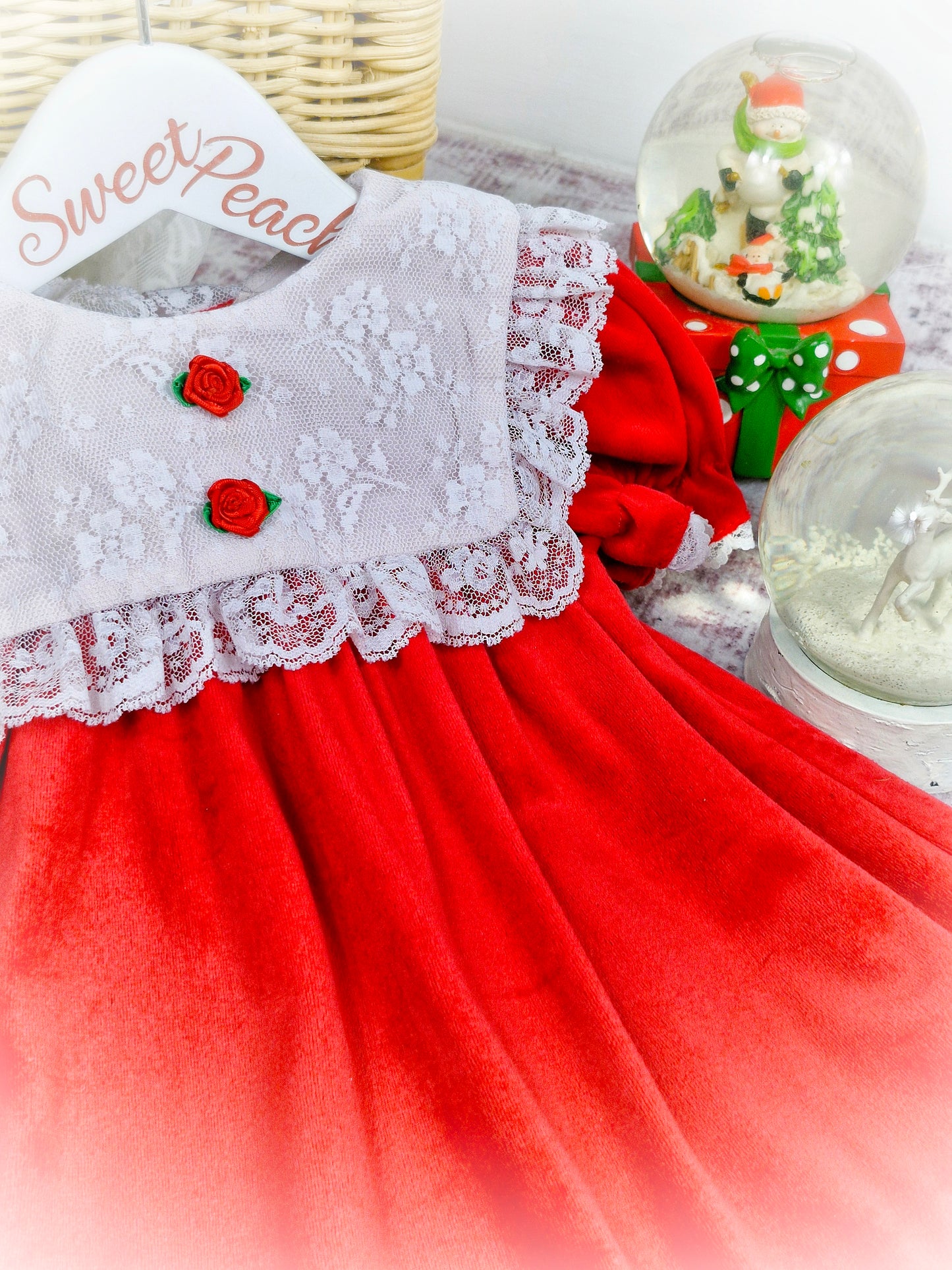12-18 months. Red soft velvet dress with white lace bib and two rosettes