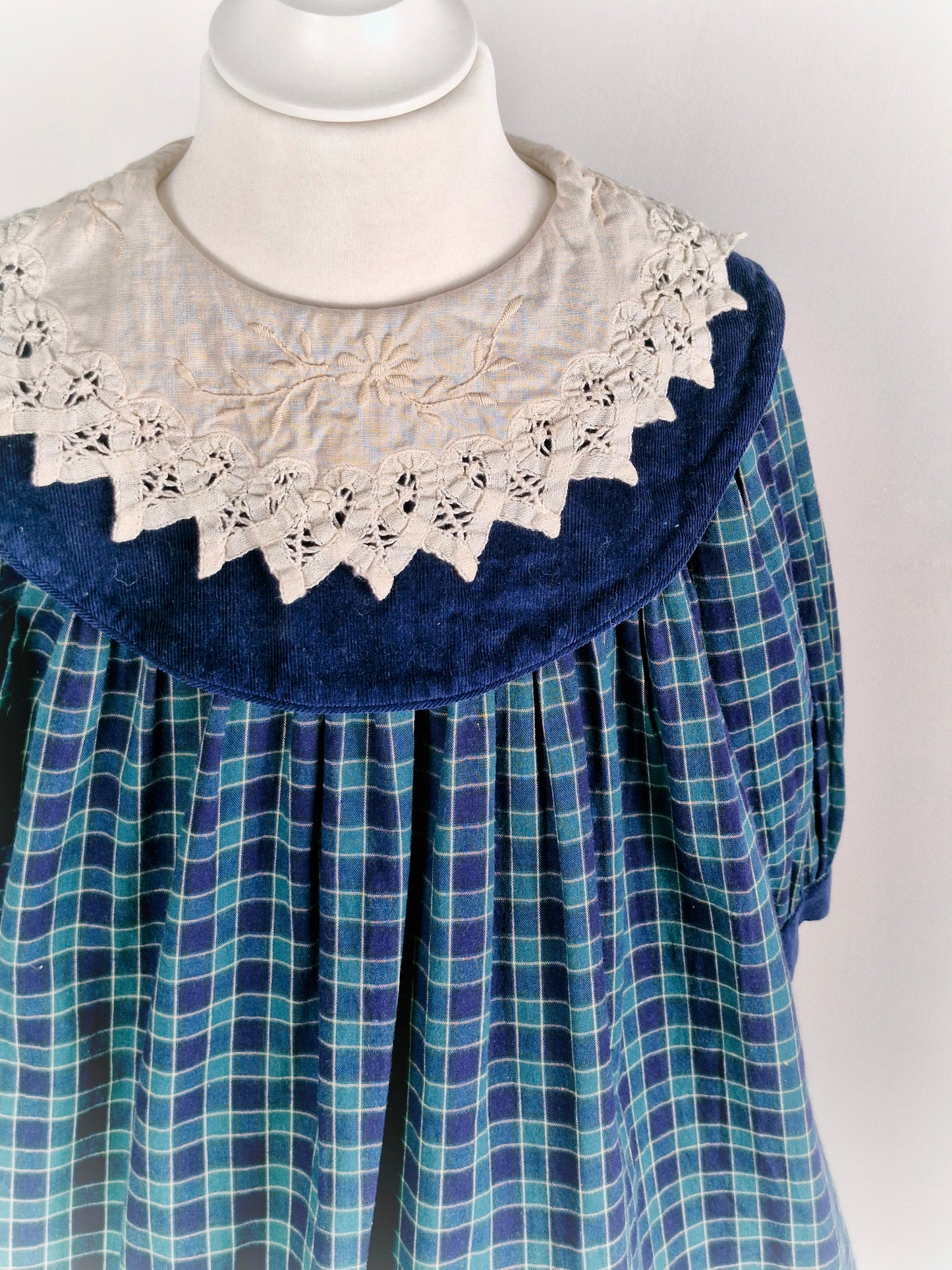 5-6 years. Navy tartan vintage dress with off-white embroidered bib