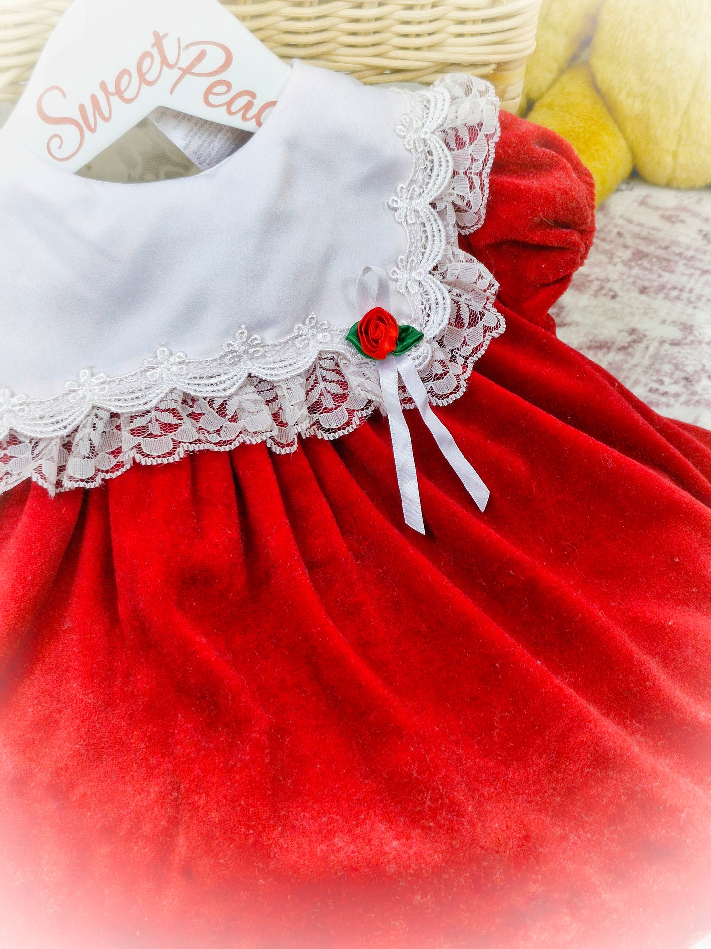 6-9 months. Red velour vintage Bryan dress with white frill bib and red rosette