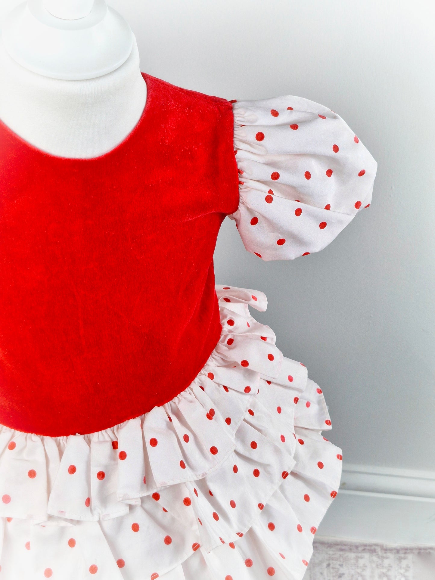 2 years. Vintage Christian Dior. Red velour with white puff sleeves, layered skirt and red polka dots