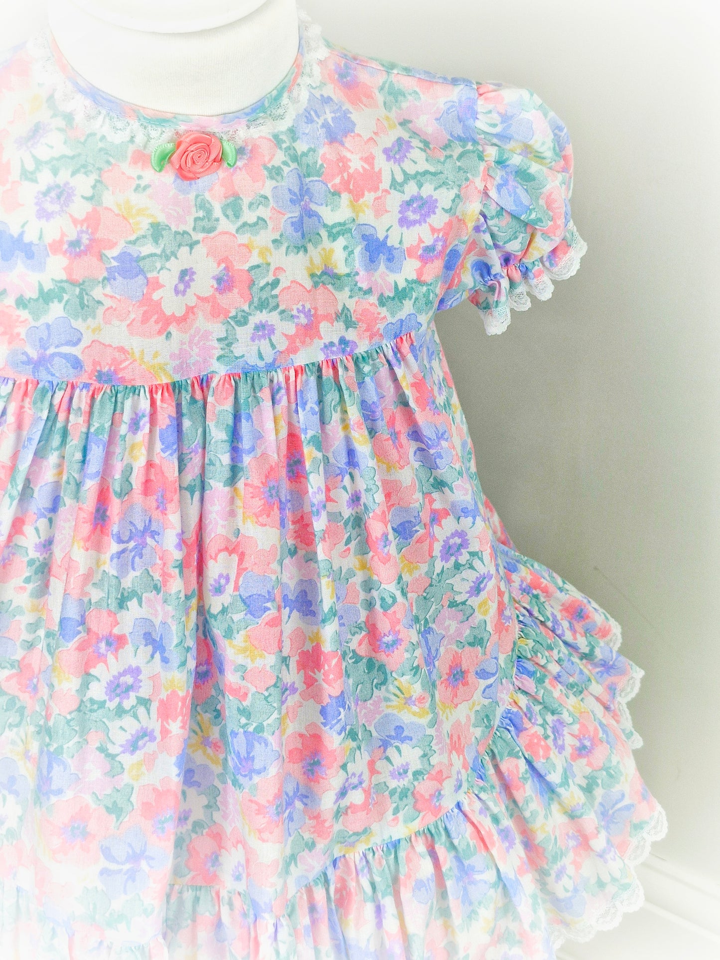 2-3 years. Pastel floral Bryan, vintage dress with dainty white lace trim