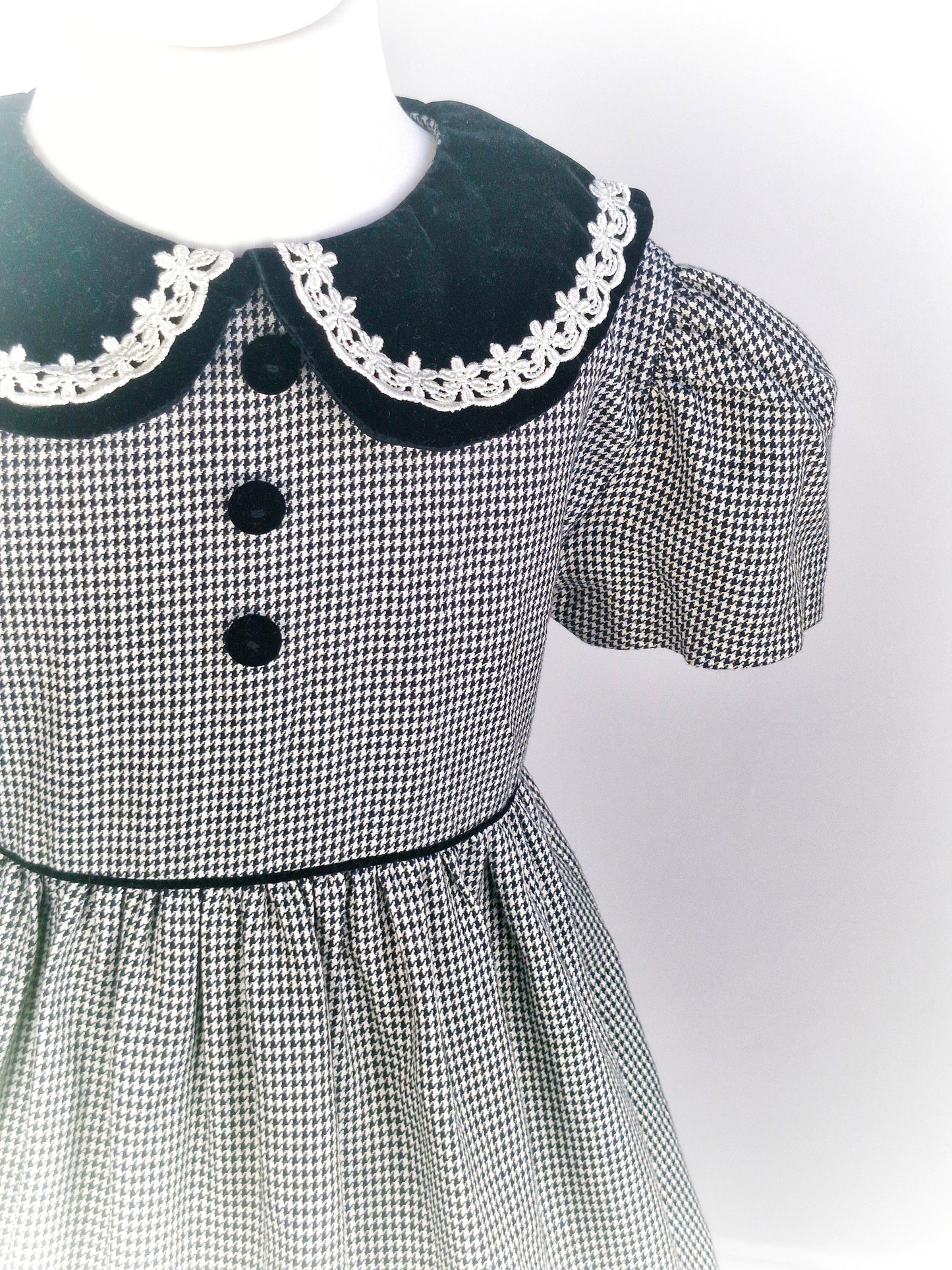 6 years. Black and white gingham dress from Bonnie Baby with black velour collar and buttons