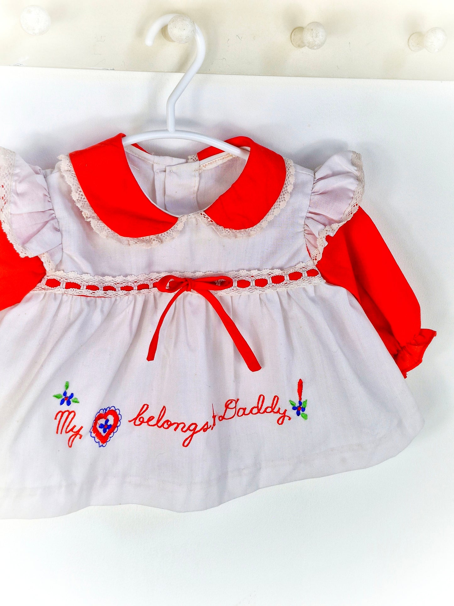 0-6 months. Red and white vintage dress with embroidered "my heart belongs to daddy"