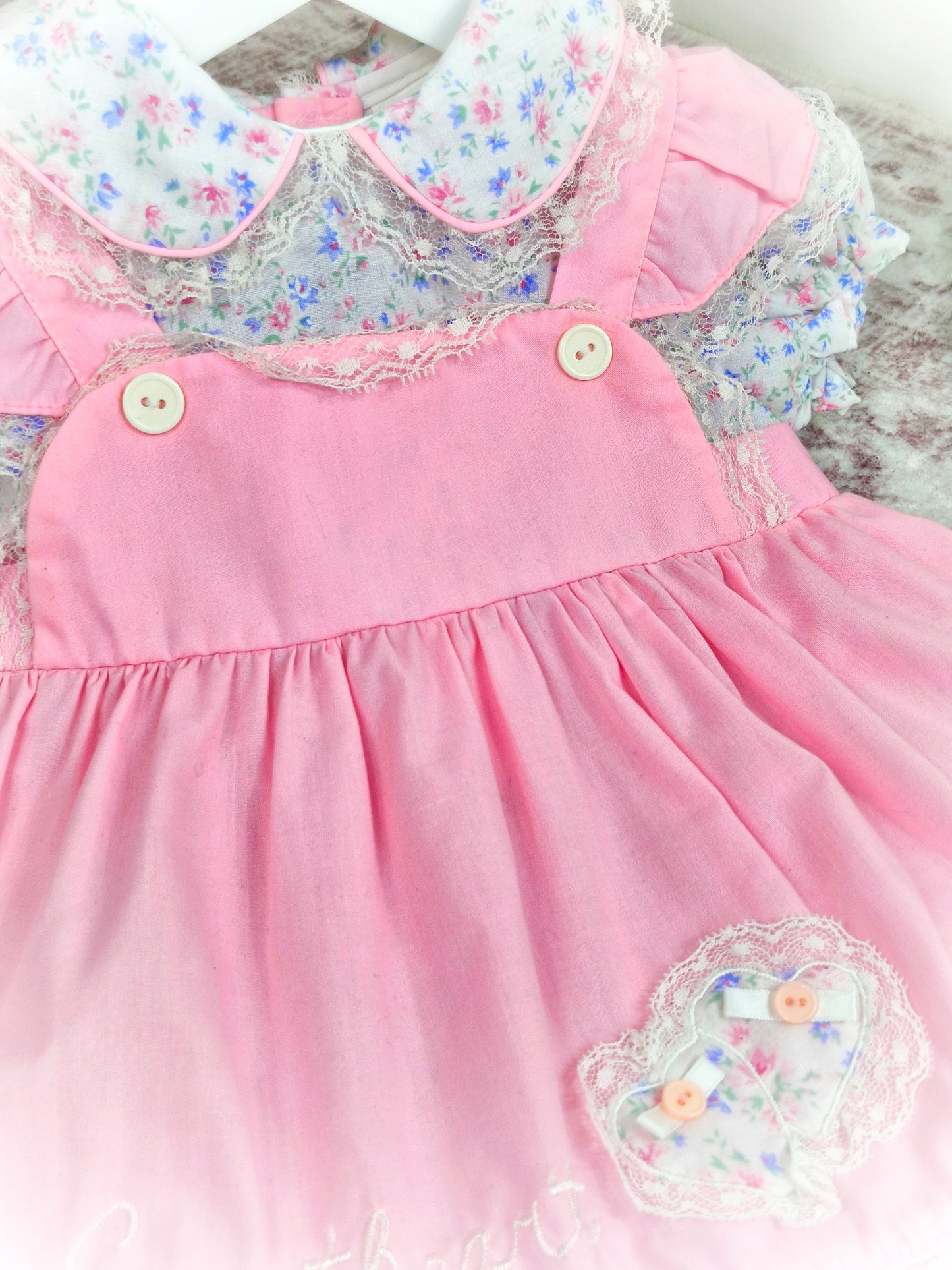 12 months. Pink vintage dress by Mayfair. Floral print, frills and embroidered "sweetheart"