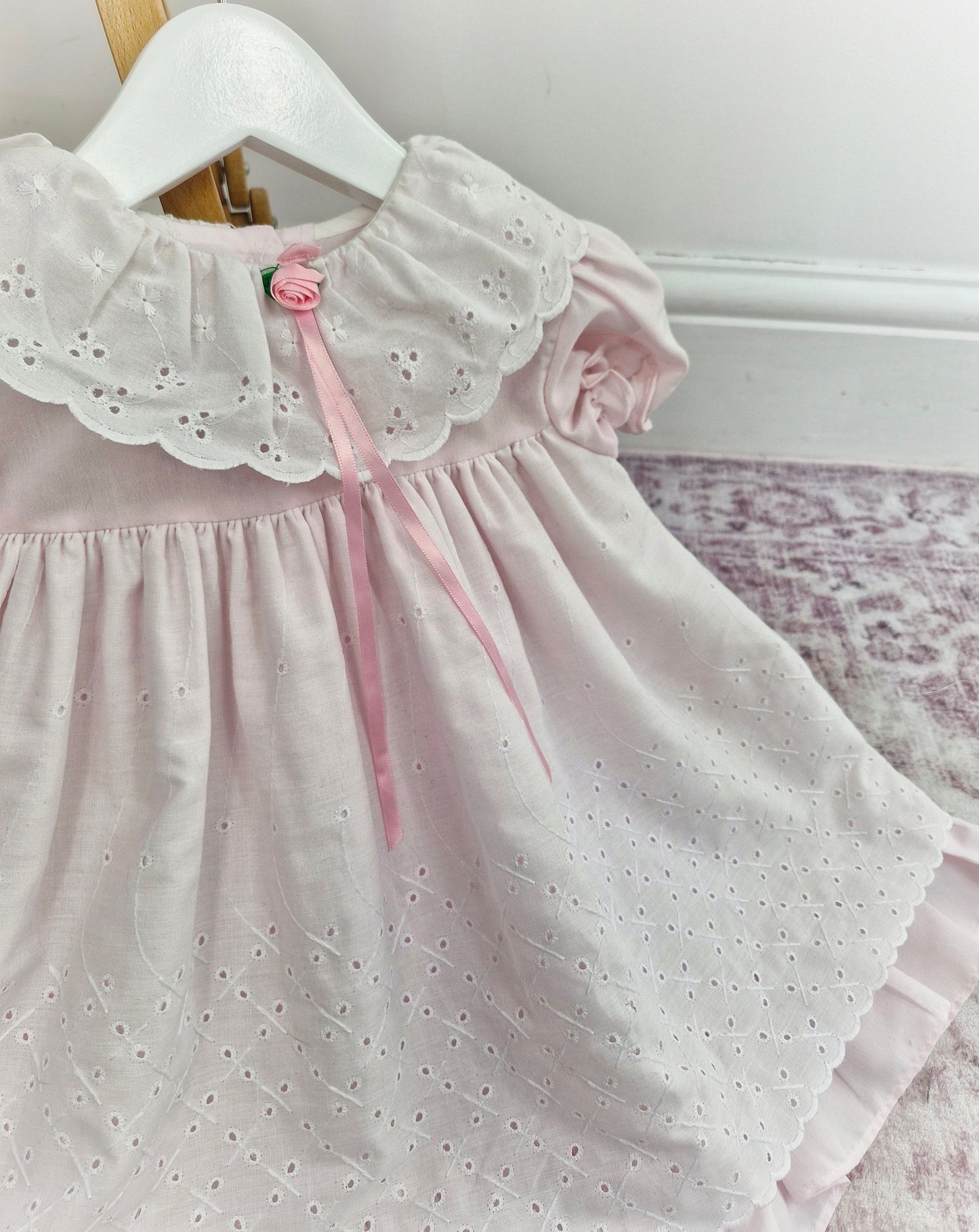 2 years. Pink and white vintage Jolene with broderie anglais details, rosette and satin ribbon