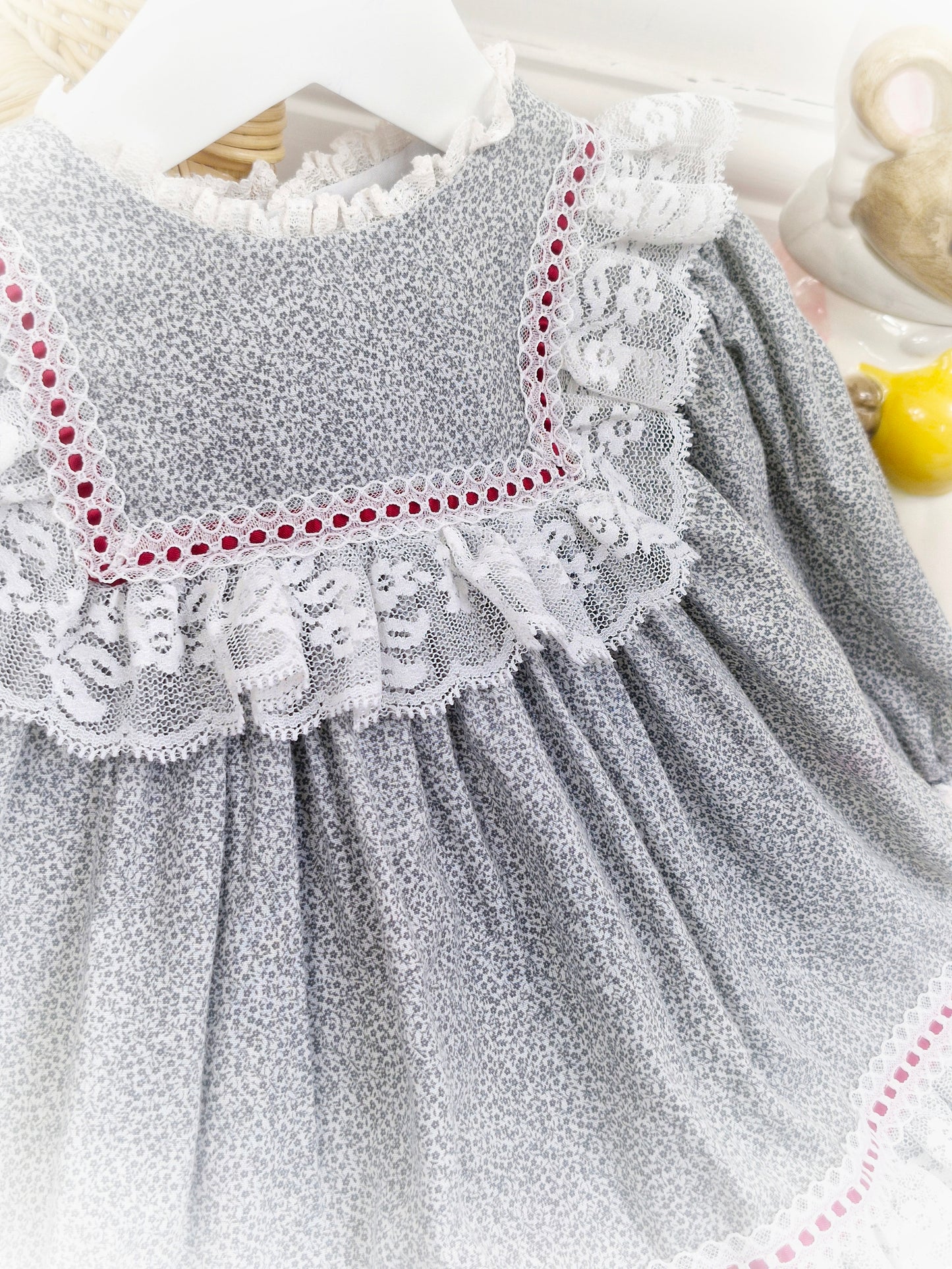 18 months. Grey floral vintage Bryan dress with white lace details and deep red ribbon