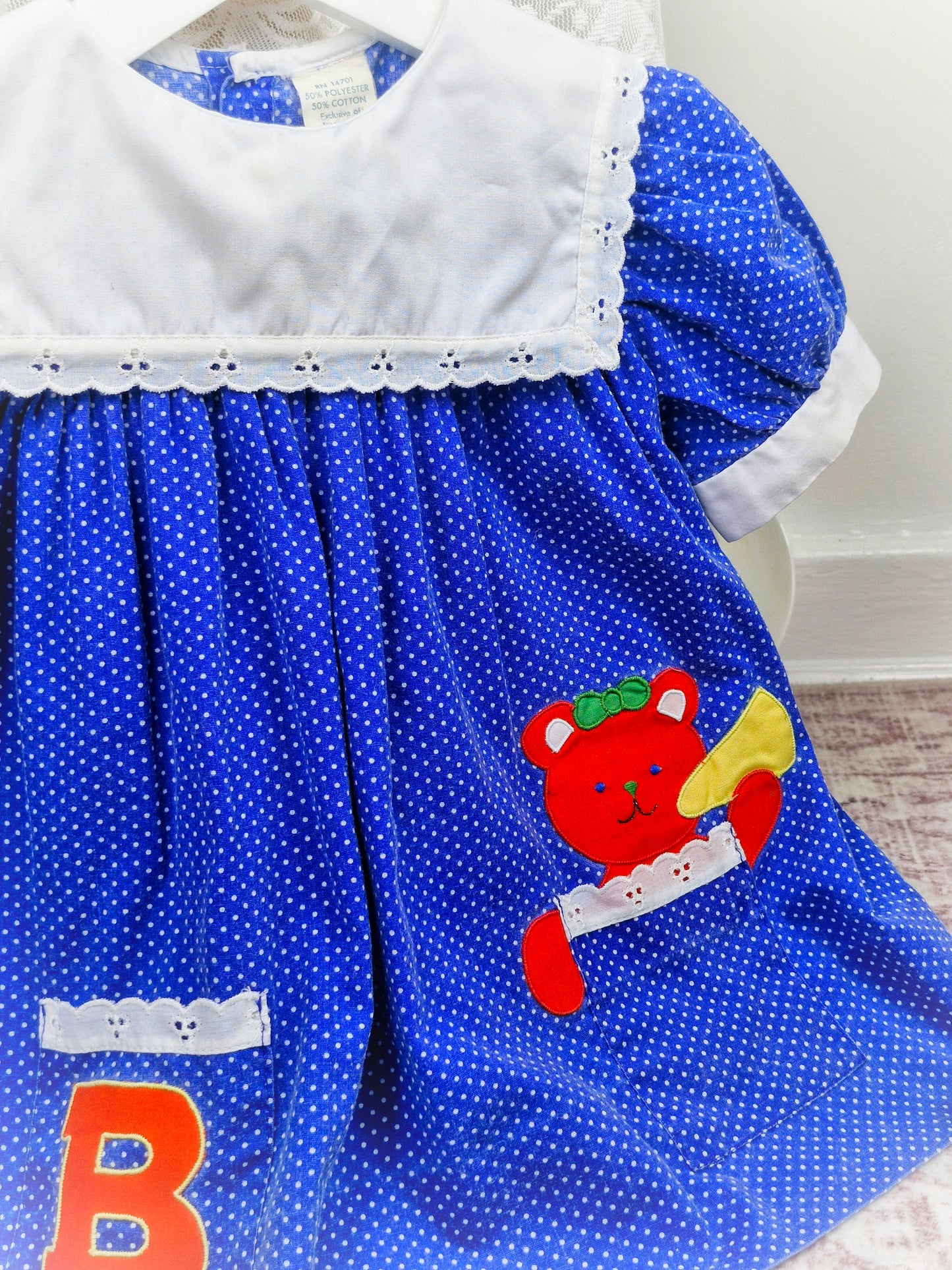 2 years. Blue polka dot vintage dress with teddy bear and letter B, white bib and trim
