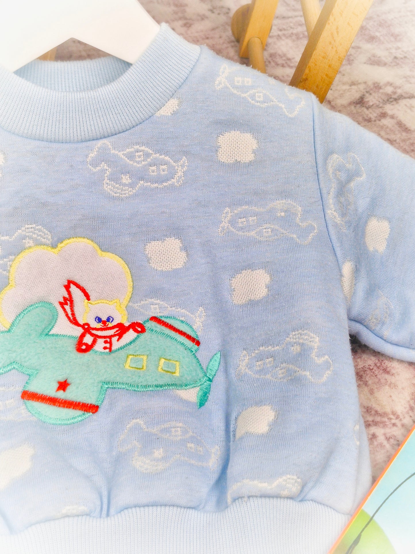 12-18 months. Blue vintage sweater from Cuties by Judy