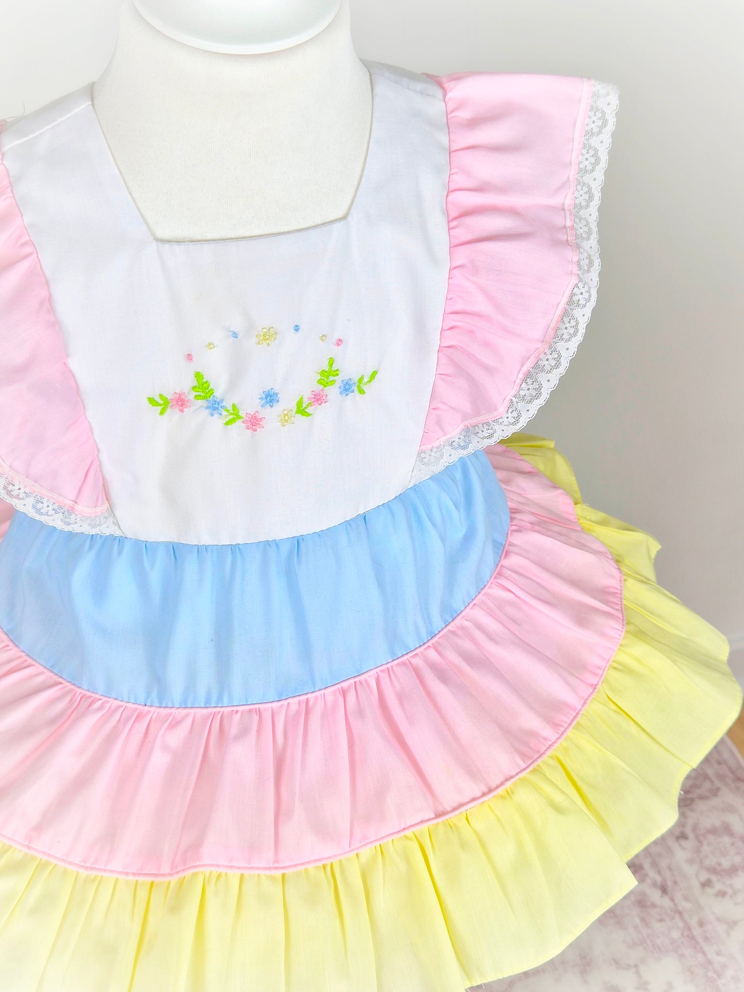 18-24 months. Pastel vintage dress with fluttet sleeves and embroidered floral designs