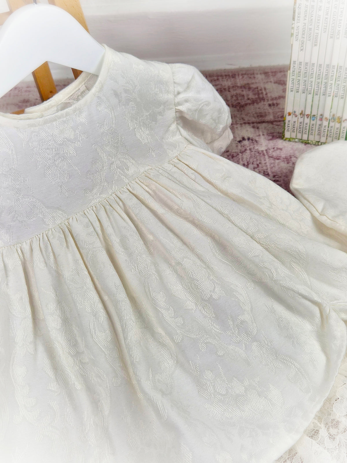 12-18 months. Cream vintage dress with puff sleeves, lace hem and matching hat