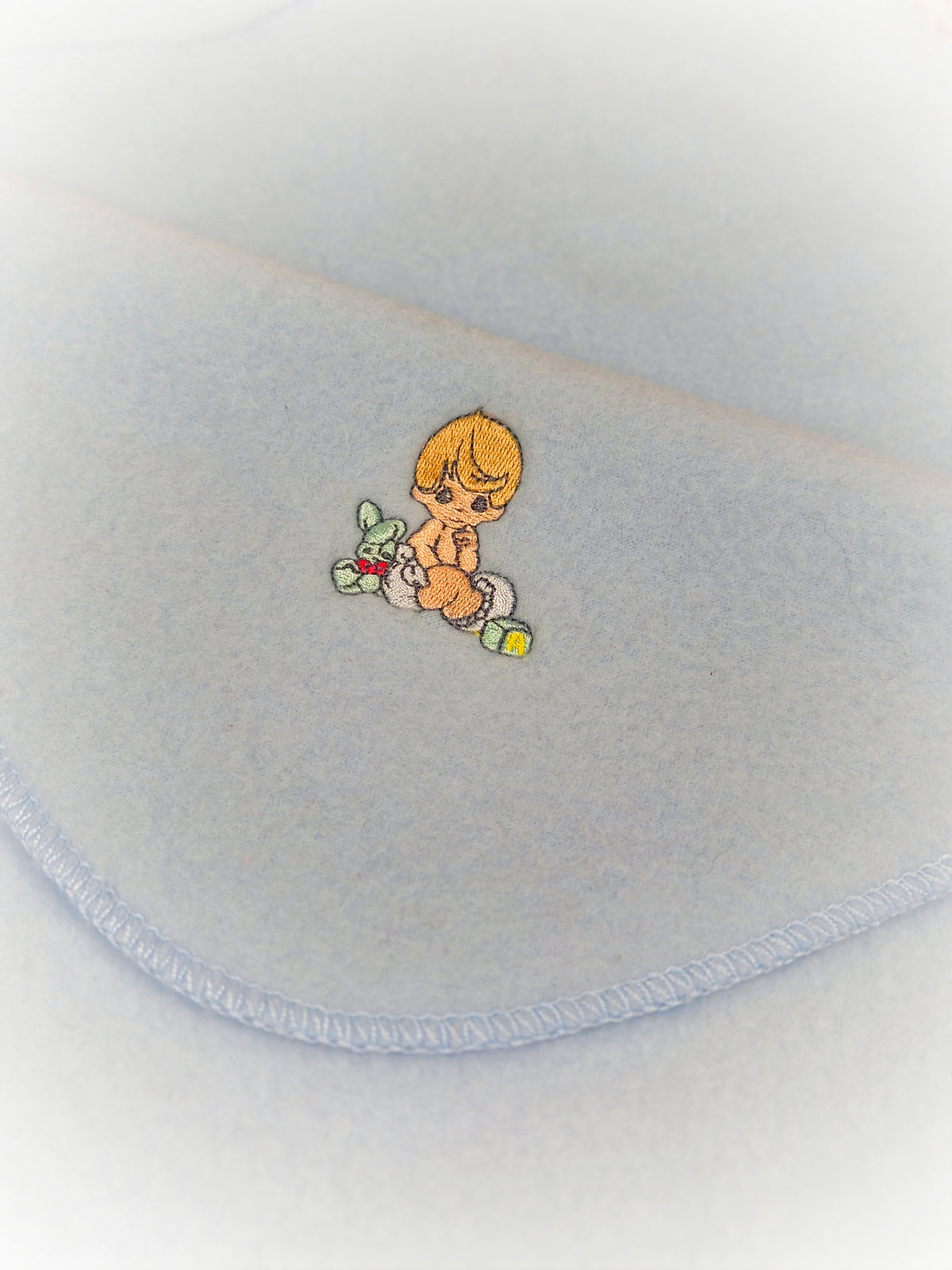Blue vintage fleece blanket with Precious Moments embroidery