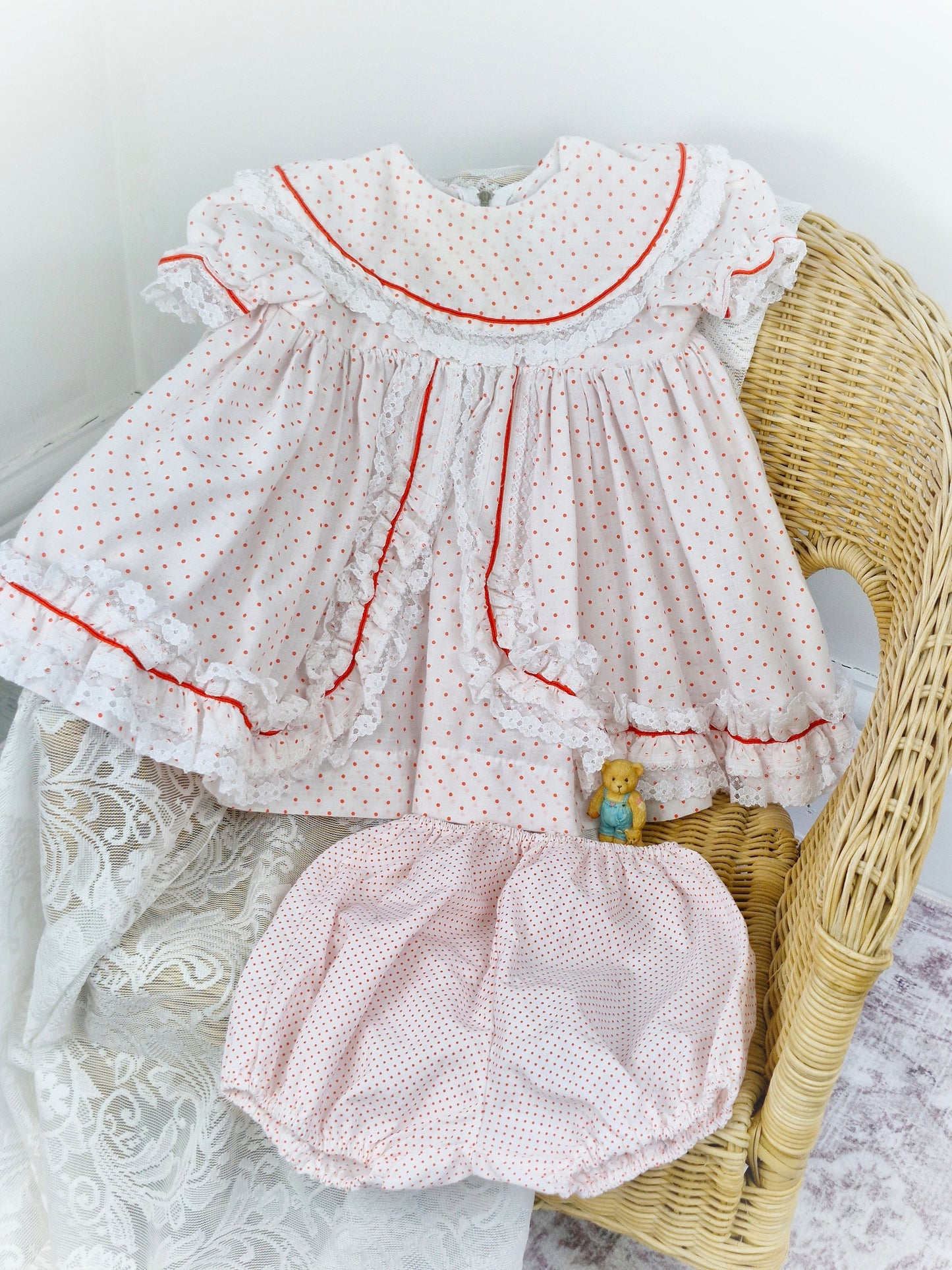 18-24 months. White dress with red polka dot and lace trim. Matching bloomers