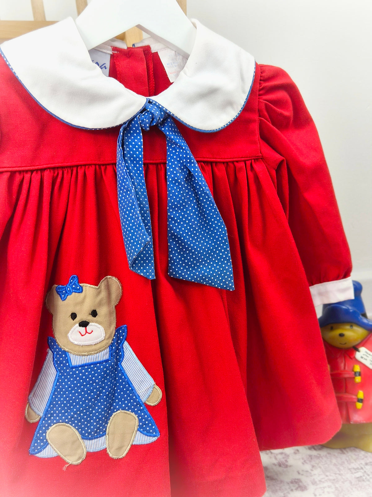18-24 months. Red vintage Samara dress with navy polka dot neck tie, white collar and teddy bear applique