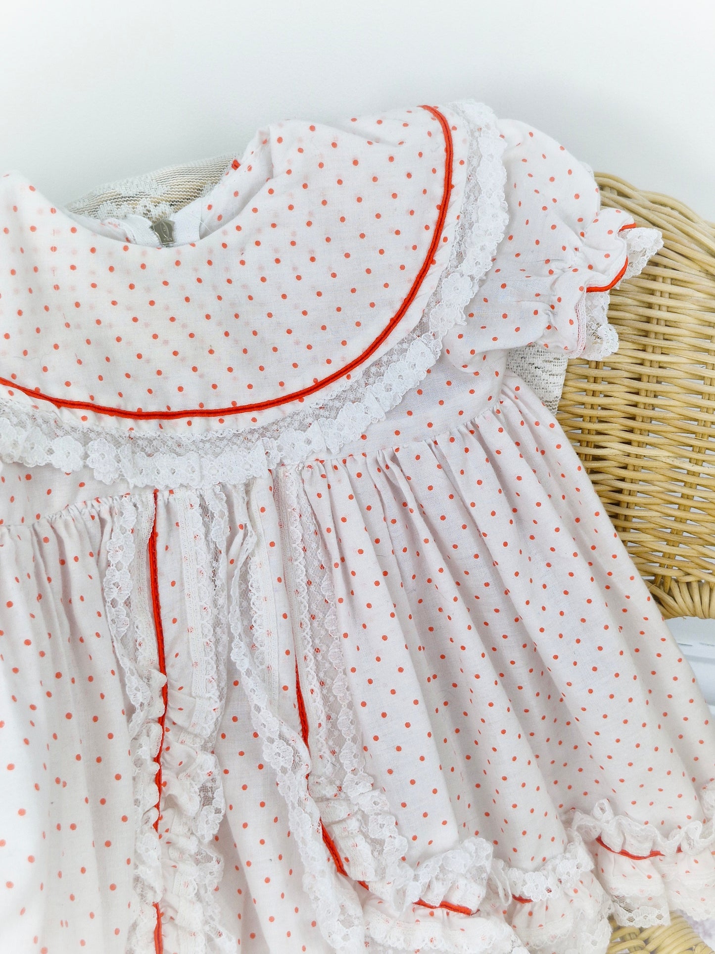 18-24 months. White dress with red polka dot and lace trim. Matching bloomers