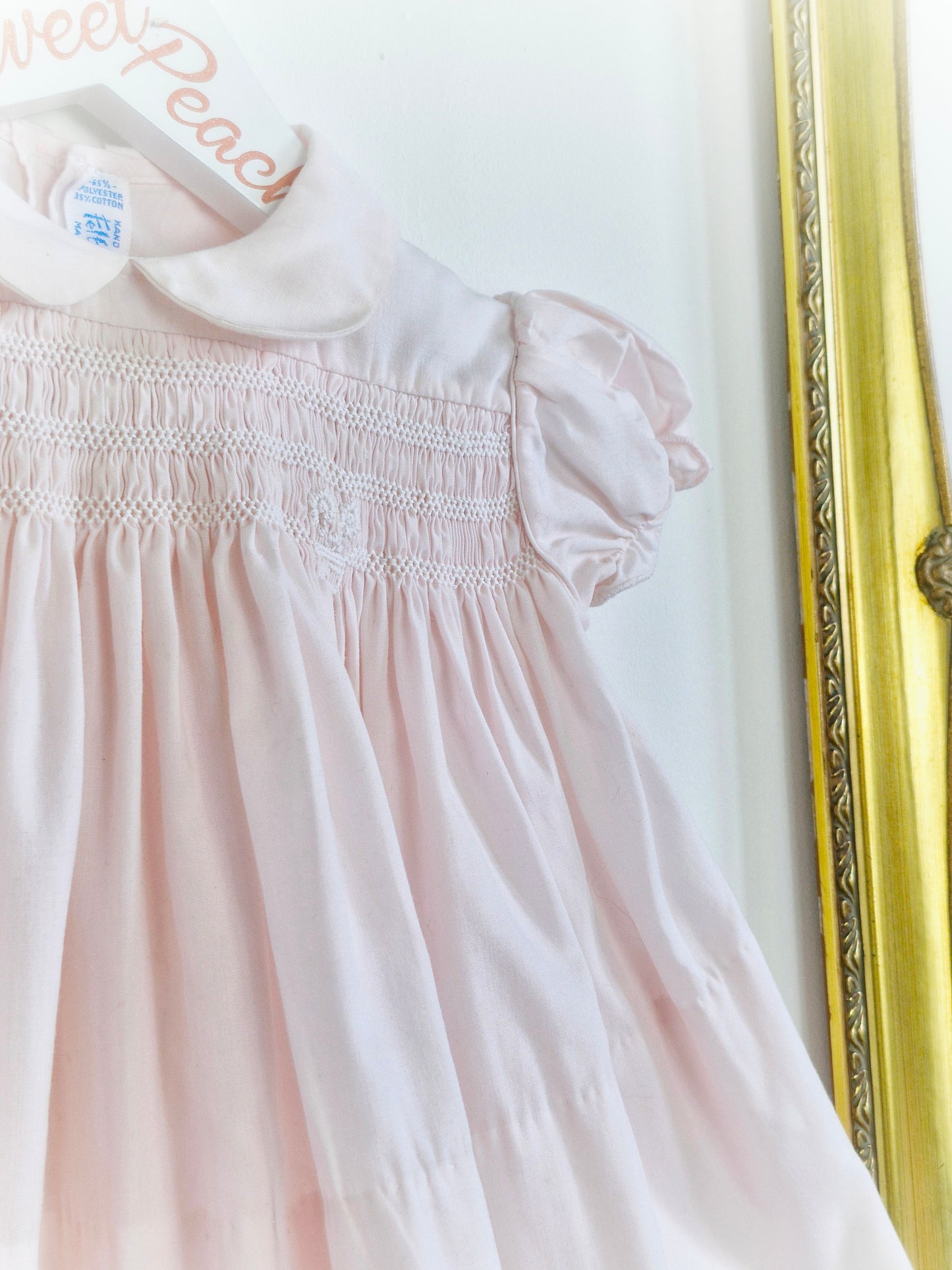 9-12 months. Feltman Bros. Pink smock dress with collar
