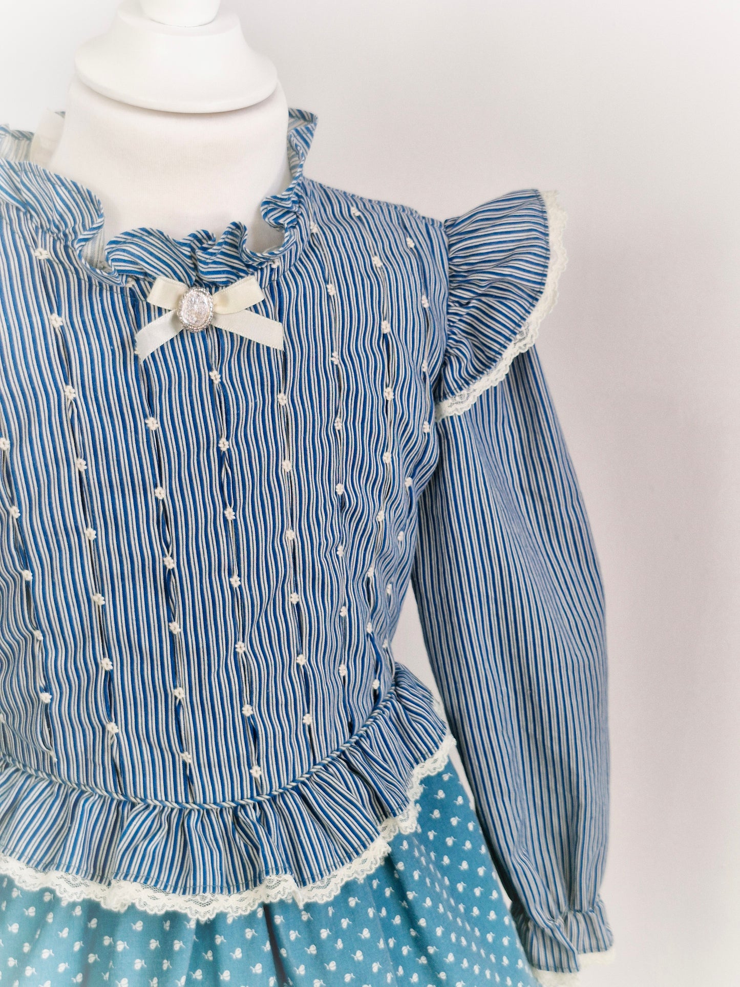 5-6 years. Blue and white smock Polly Flinders