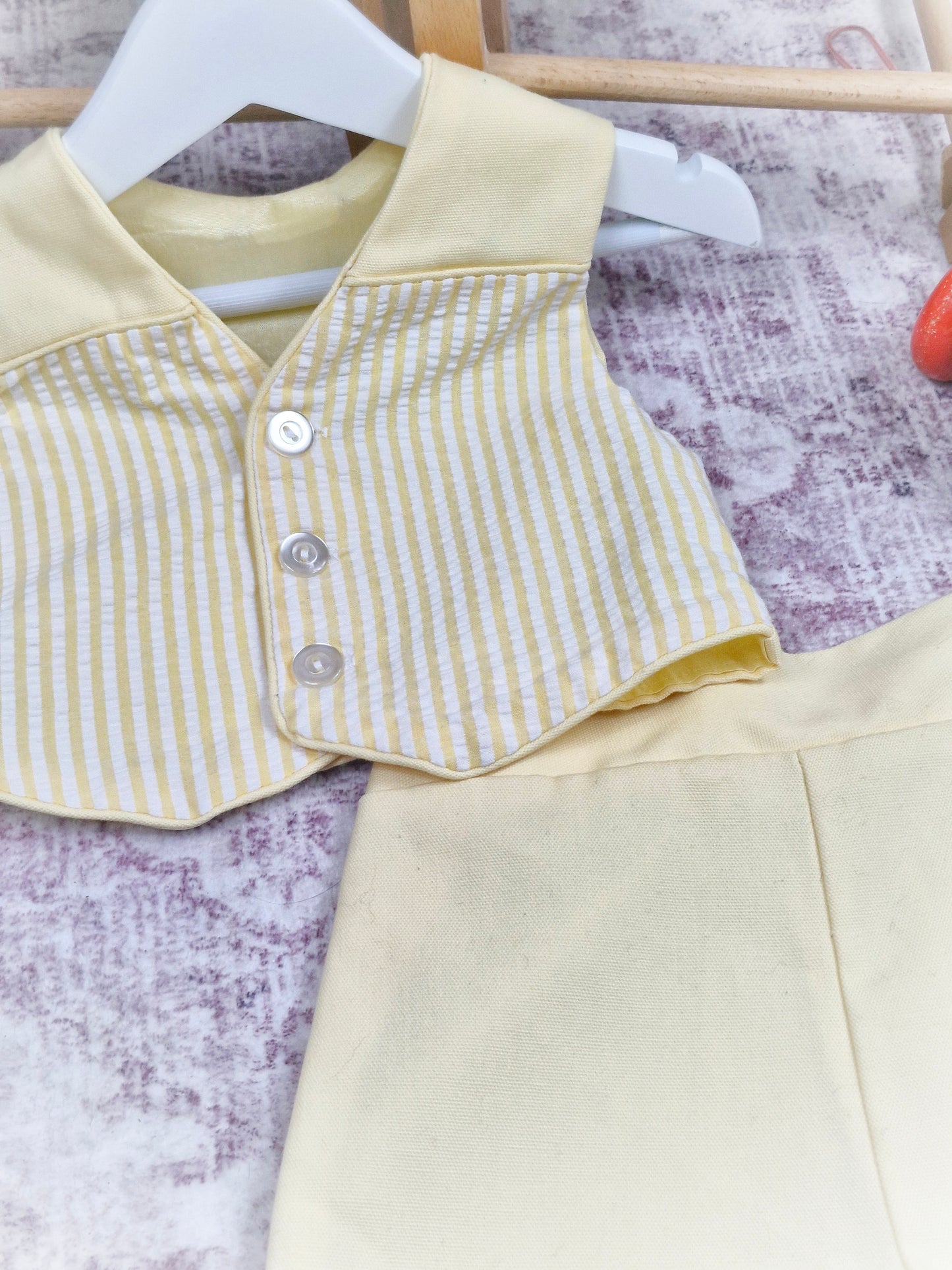 12 months. Two piece set, lemon and white striped waistcoat with matching shorts