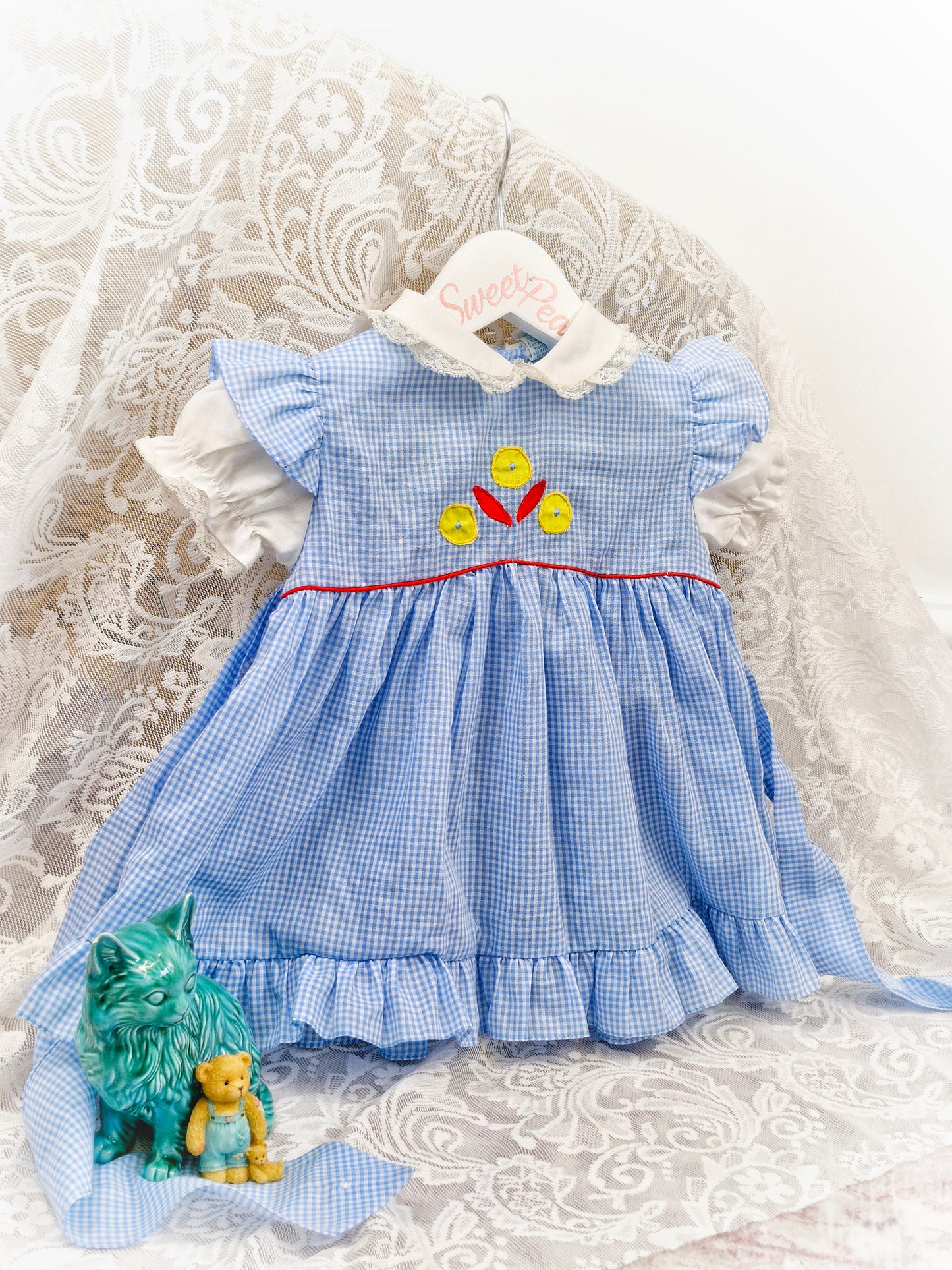 12 months. Blue and white gingham dress