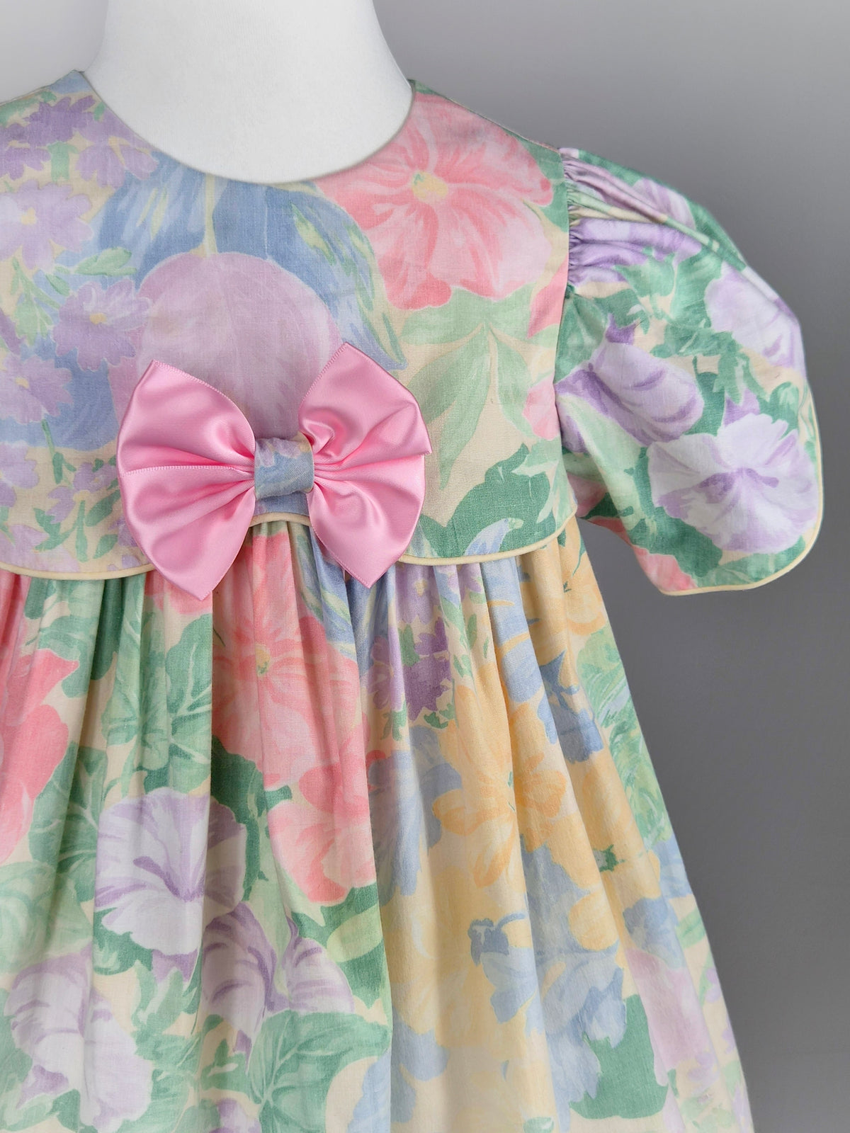 5 years. Pastel floral vintage dress with pink satin bow
