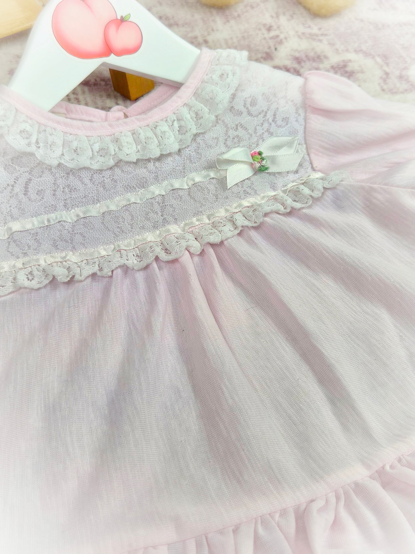 3-6 months. Pale pink Frilly Nightie with white lace