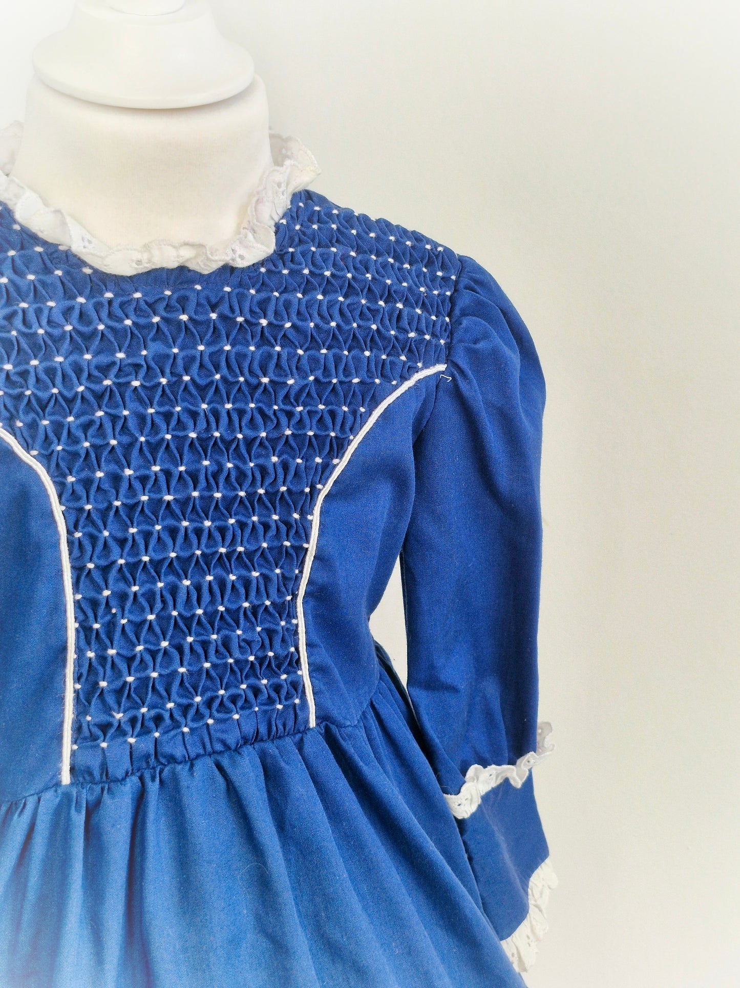 3 years. Navy and white high-neck smock dress
